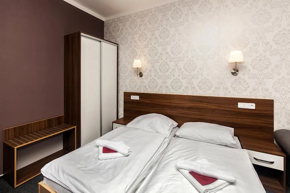 Bed in Hotel Arkáda