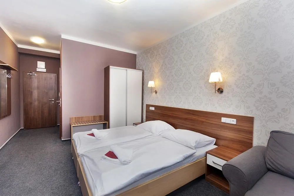 Bed in Hotel Arkáda