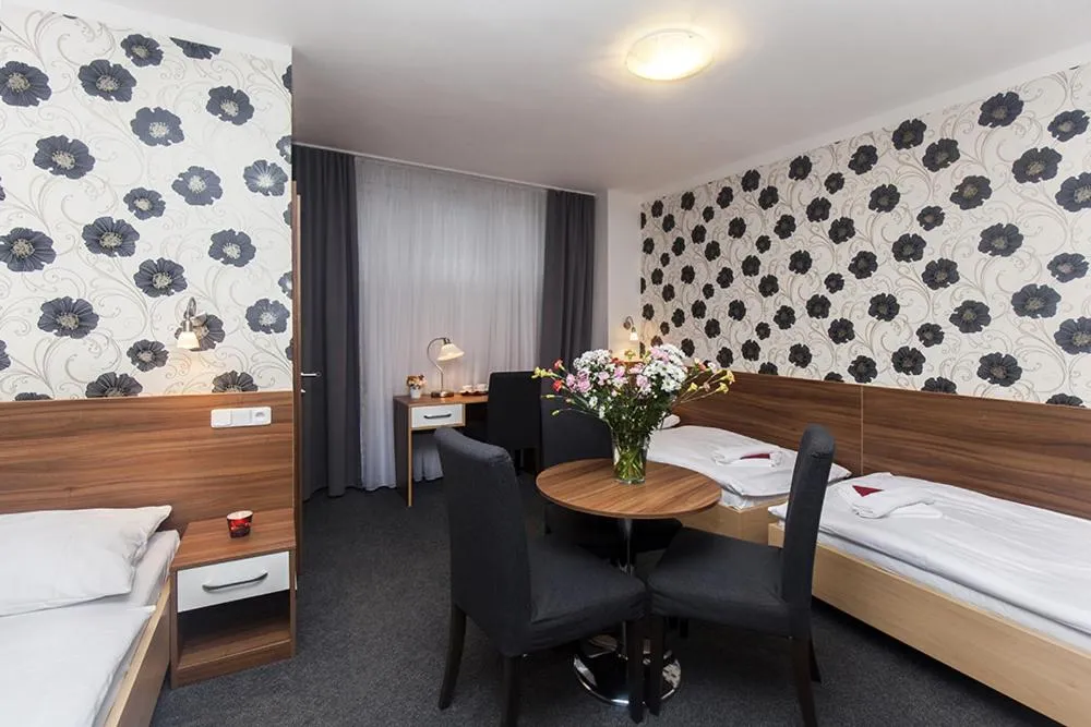 Bed in Hotel Arkáda