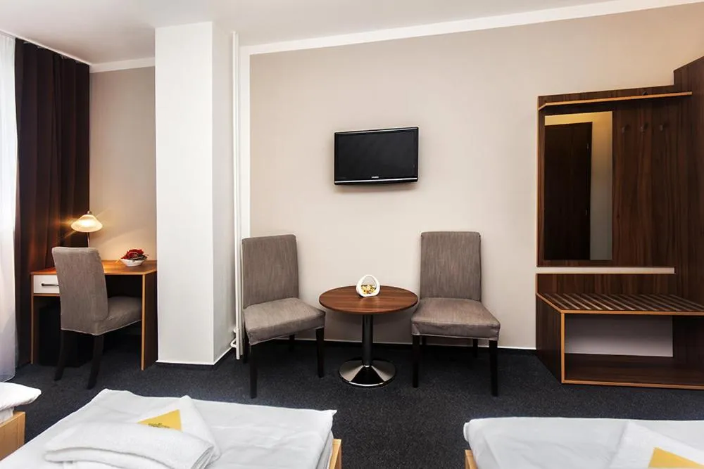 Bed in Hotel Arkáda