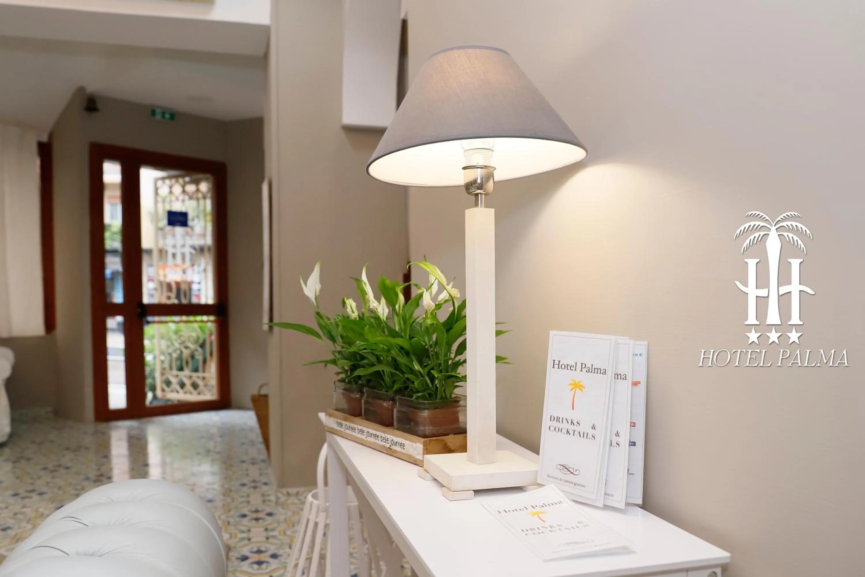 Property logo or sign in Hotel Palma