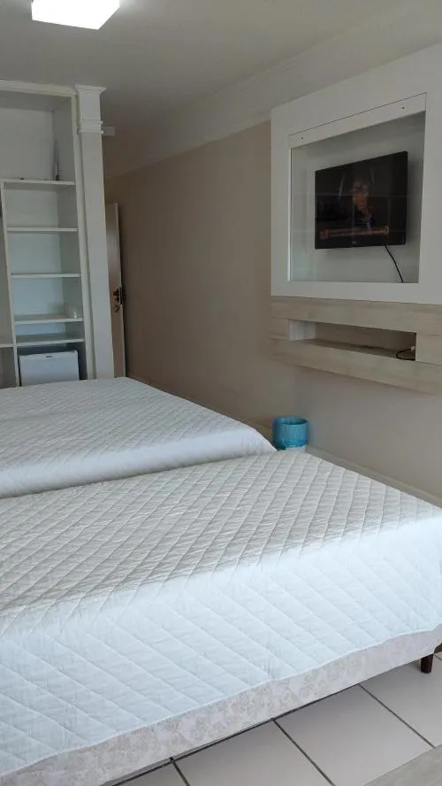 Bed in Hotel Araçá