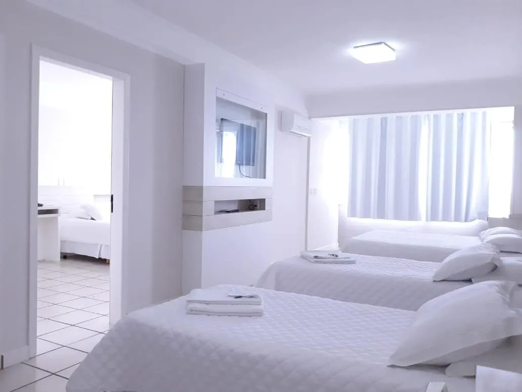 Bed in Hotel Araçá