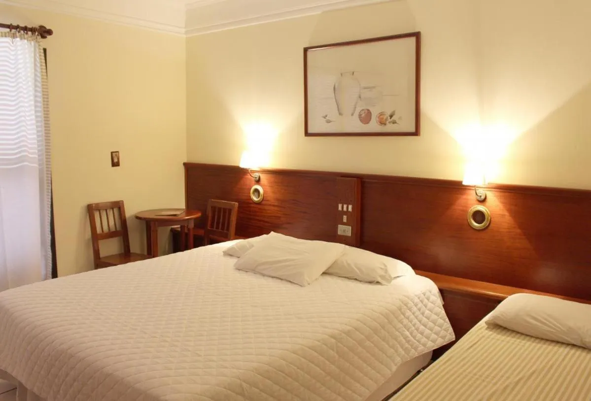 Bed in Hotel Araçá