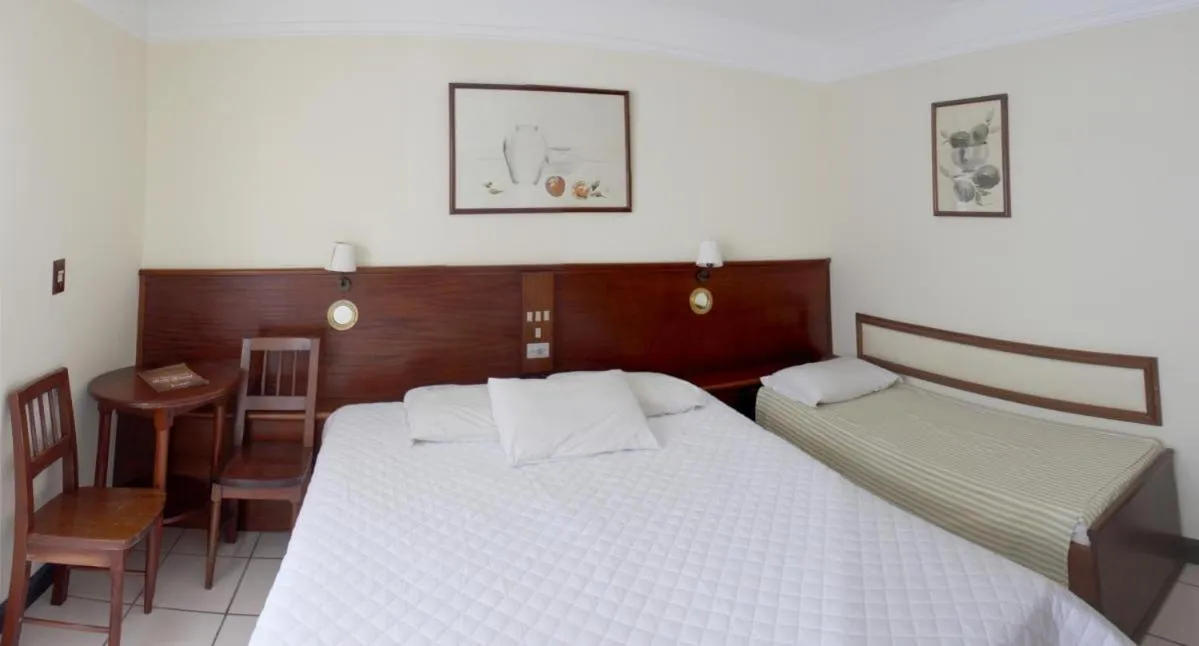 Bed in Hotel Araçá