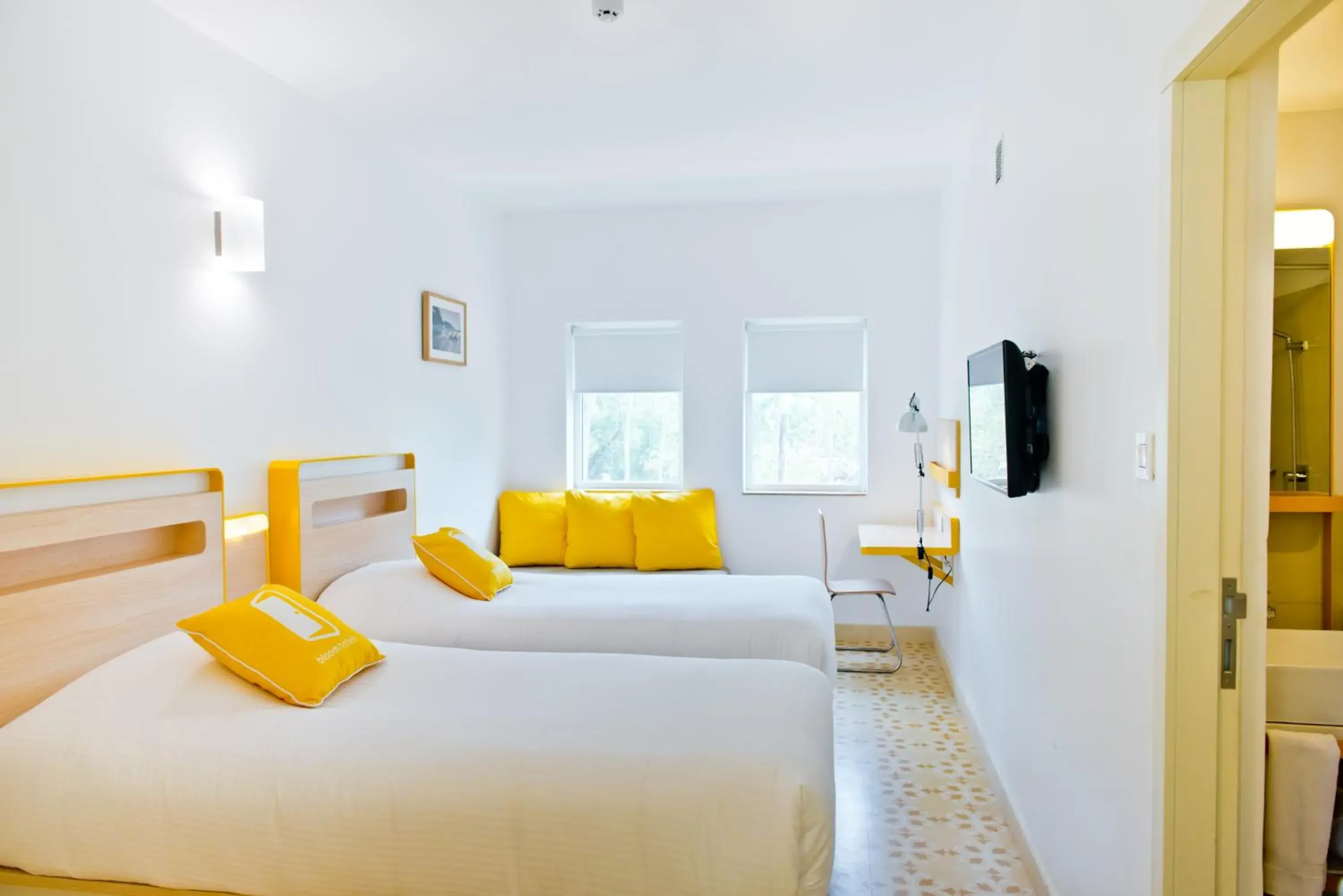 Standard Twin Room - single occupancy in Bloomrooms Calangute Standard Twin Room - single occupancy in Bloomrooms Calangute