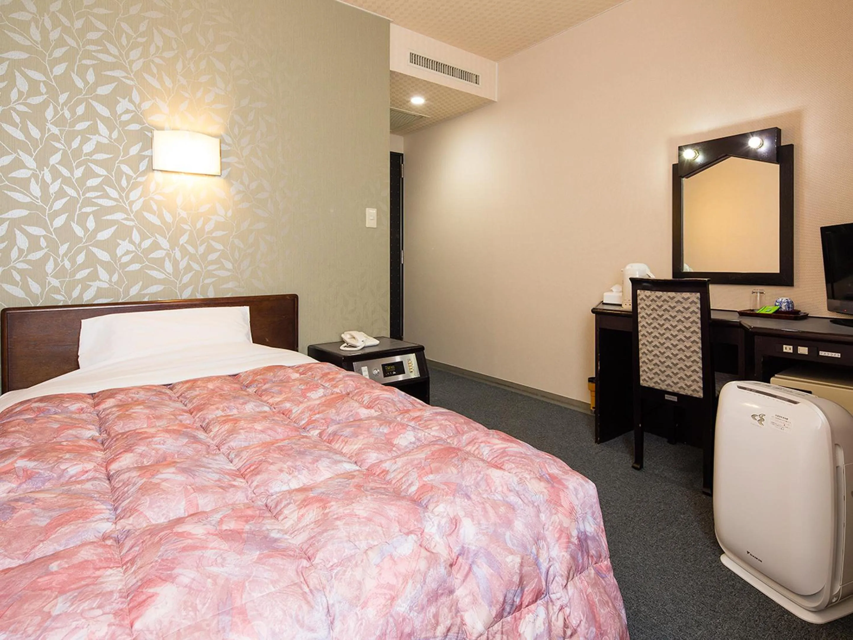 Bed in Kotohira Riverside Hotel