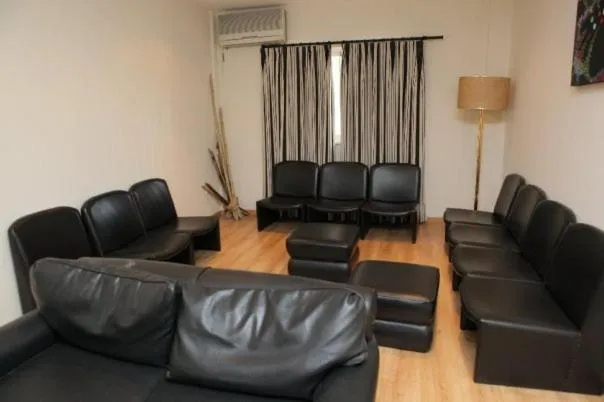 Communal lounge/ TV room in Petrus Hotel