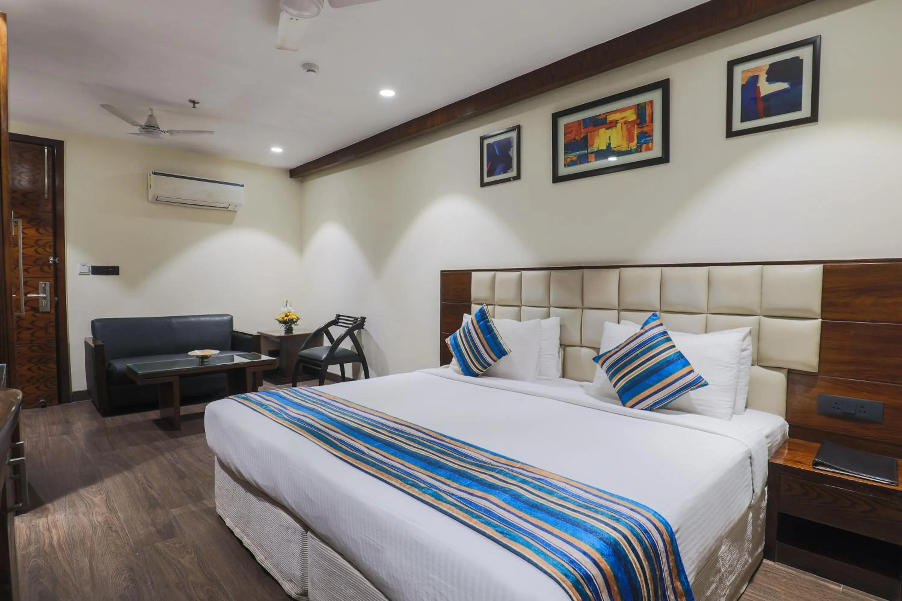 Bedroom, Bed in Hotel Bluestone Nehru Place by The Cosy Hotels
