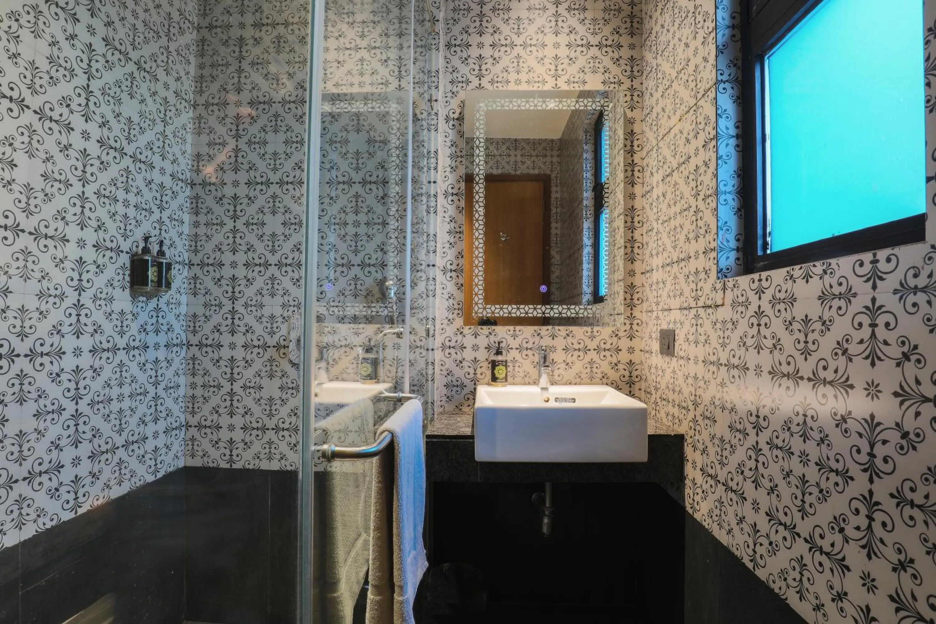 Bathroom in Hotel Bluestone Nehru Place by The Cosy Hotels