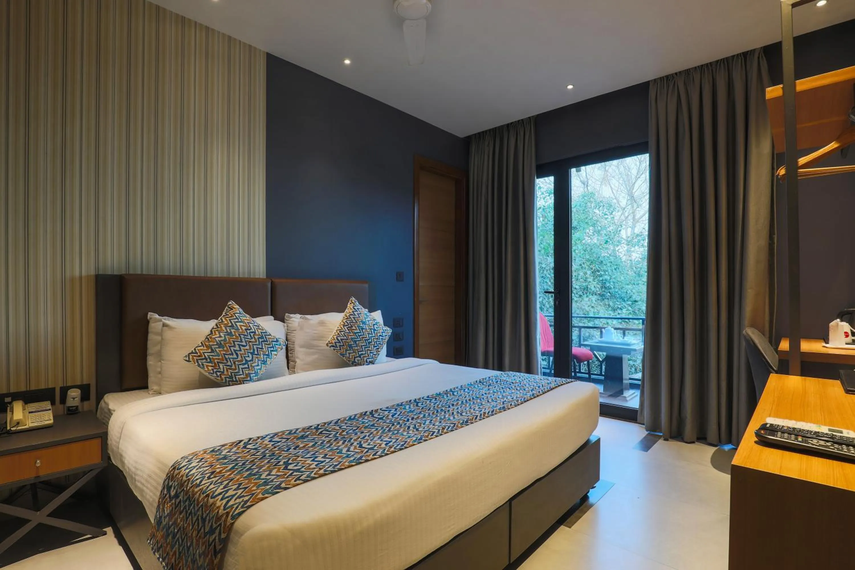 Bedroom, Bed in Hotel Bluestone Nehru Place by The Cosy Hotels