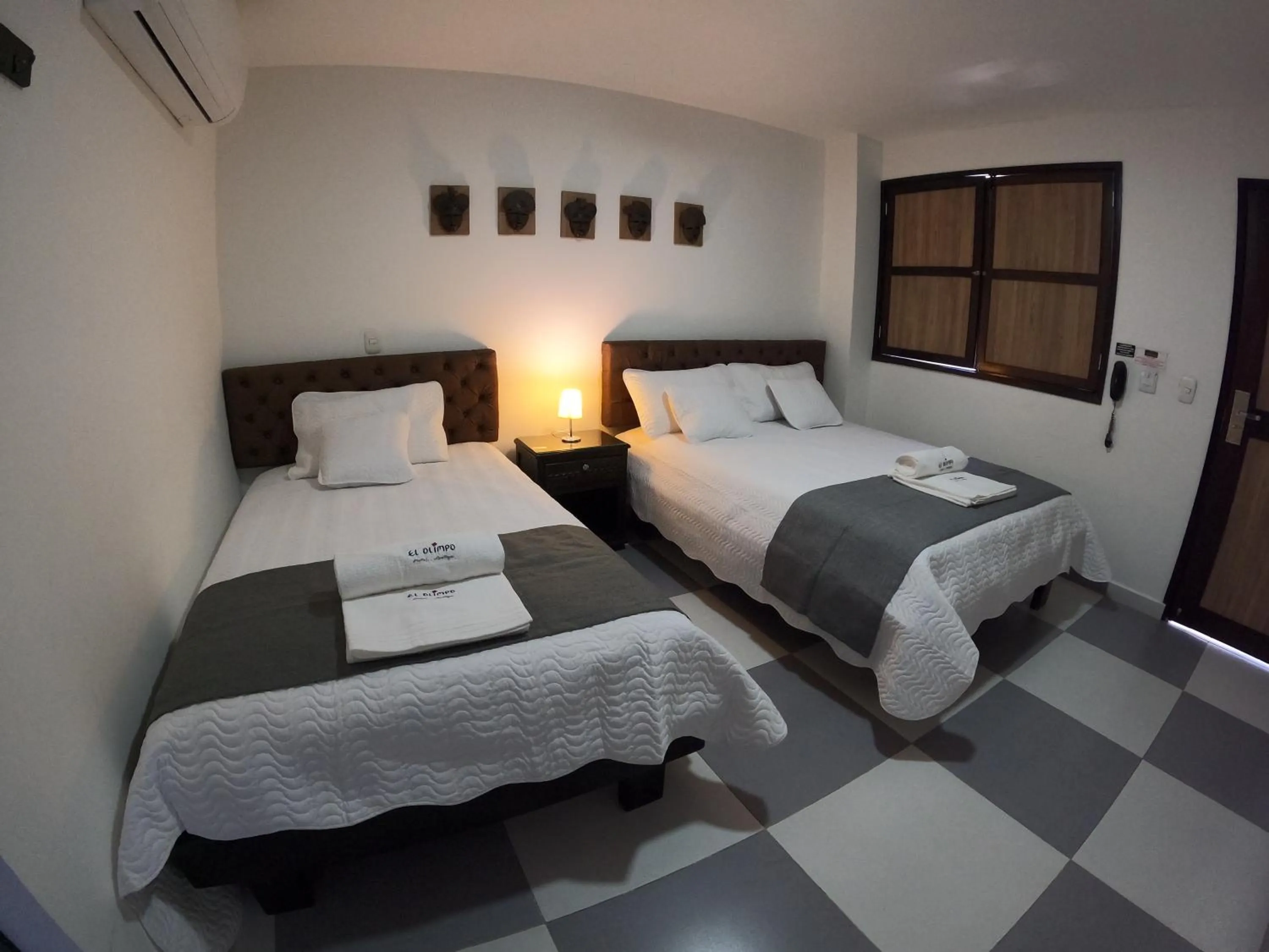 Bed in Hotel El Olimpo