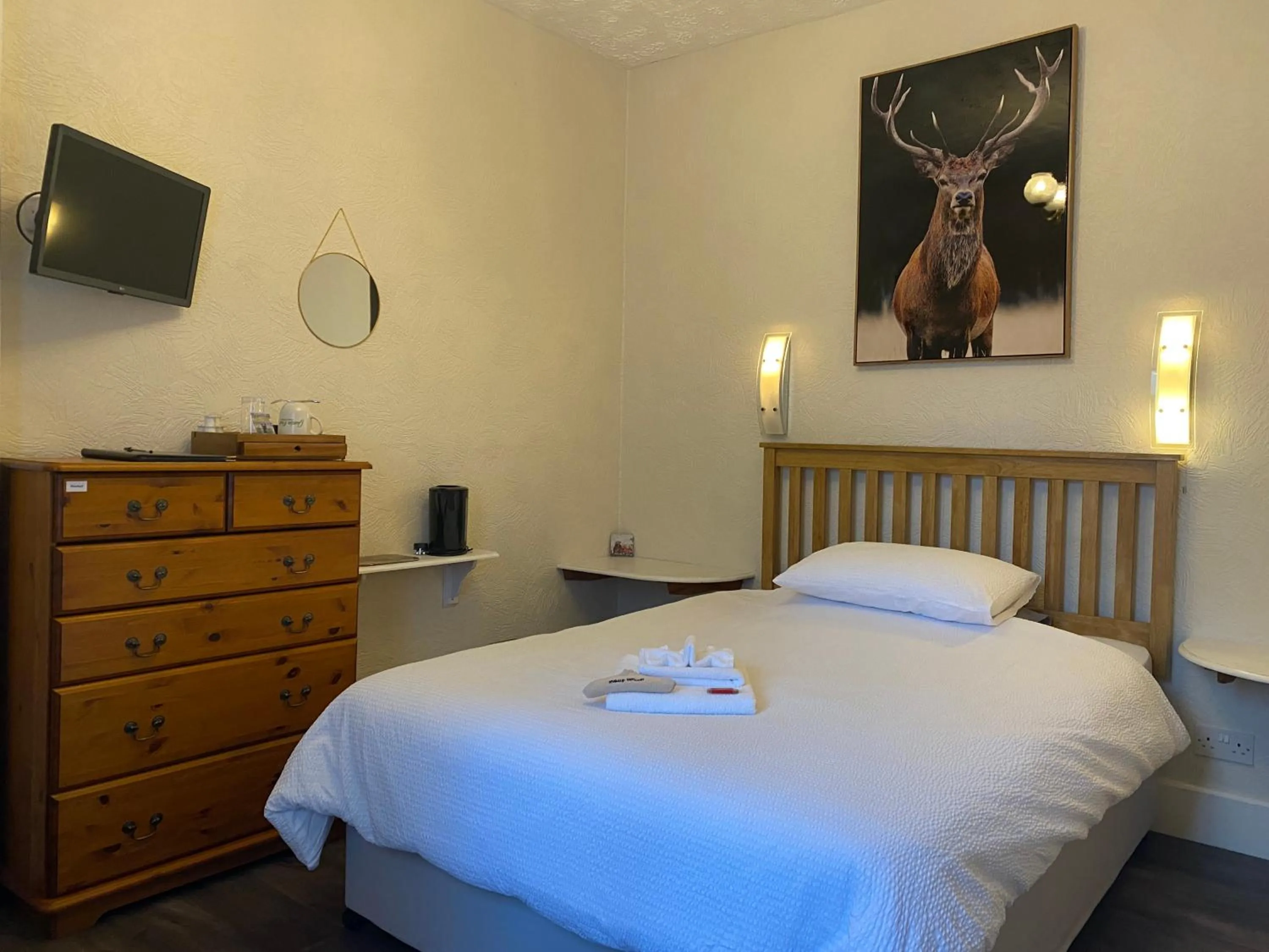 Bed in Garden Park Guest House