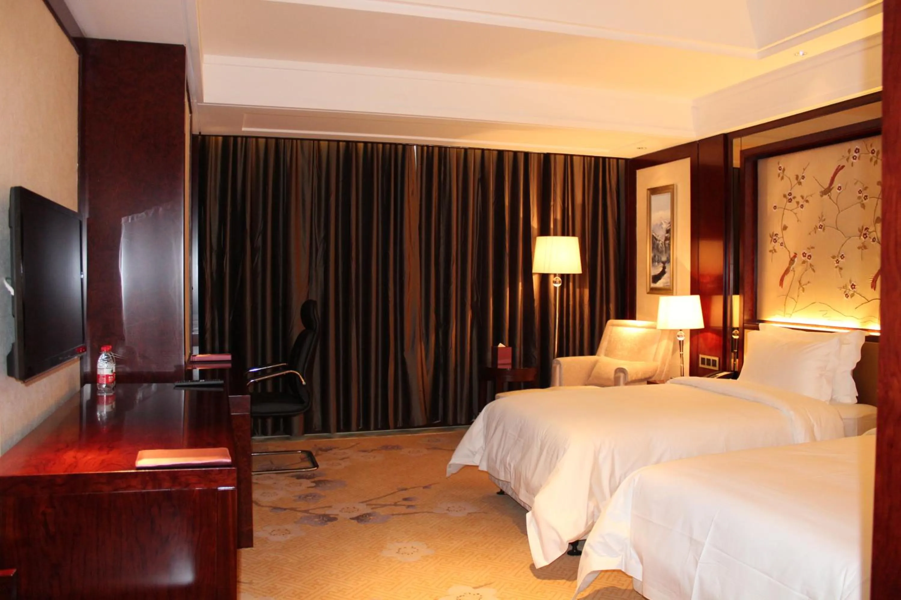 Bed in Tai Zhou International Jinling Hotel