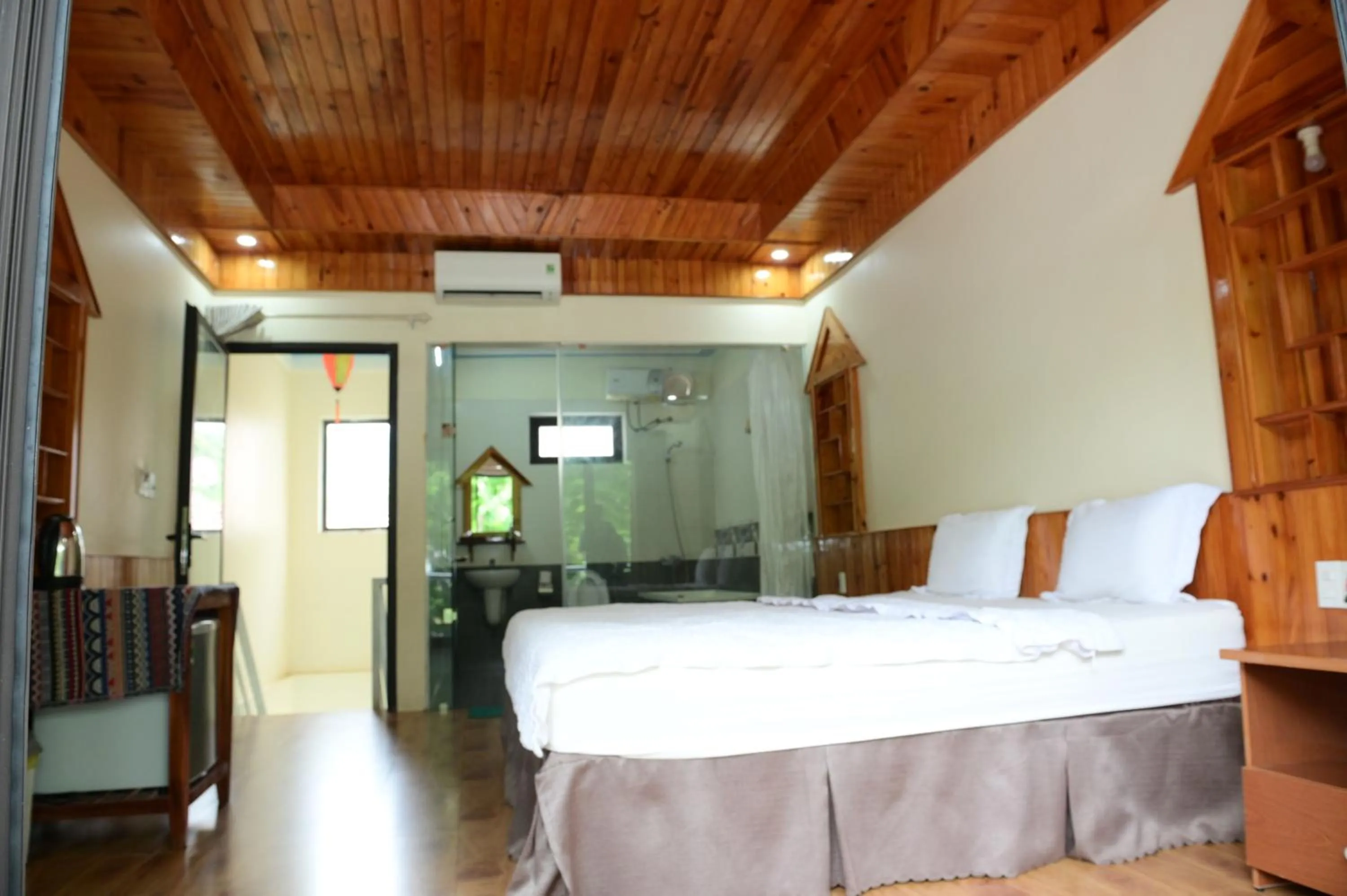 Bed in Restful River Bungalow