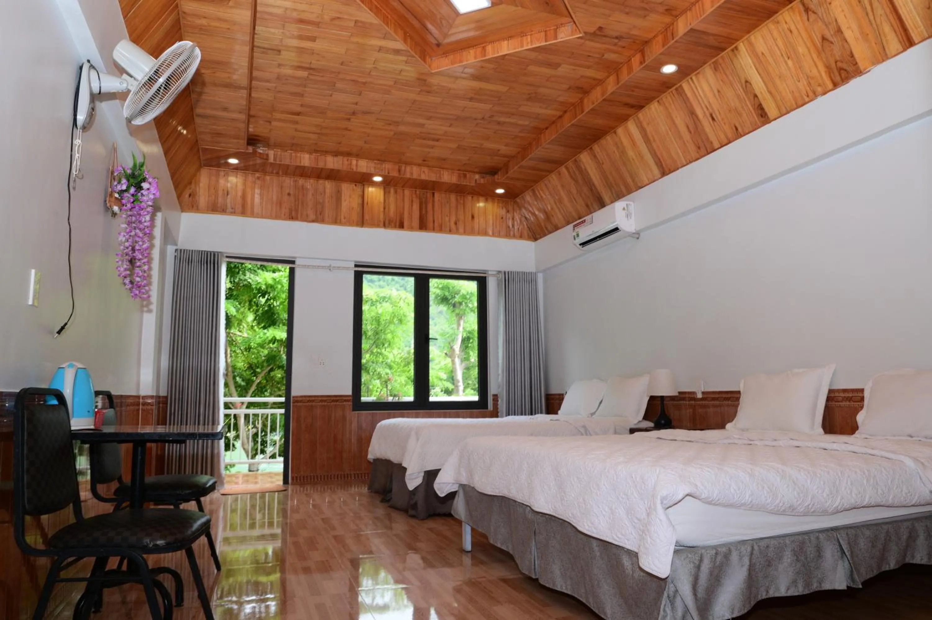 Bed in Restful River Bungalow