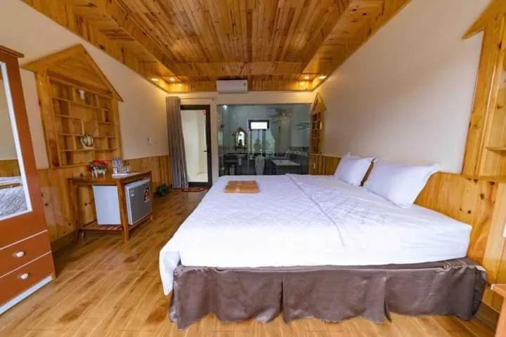 Bed in Restful River Bungalow