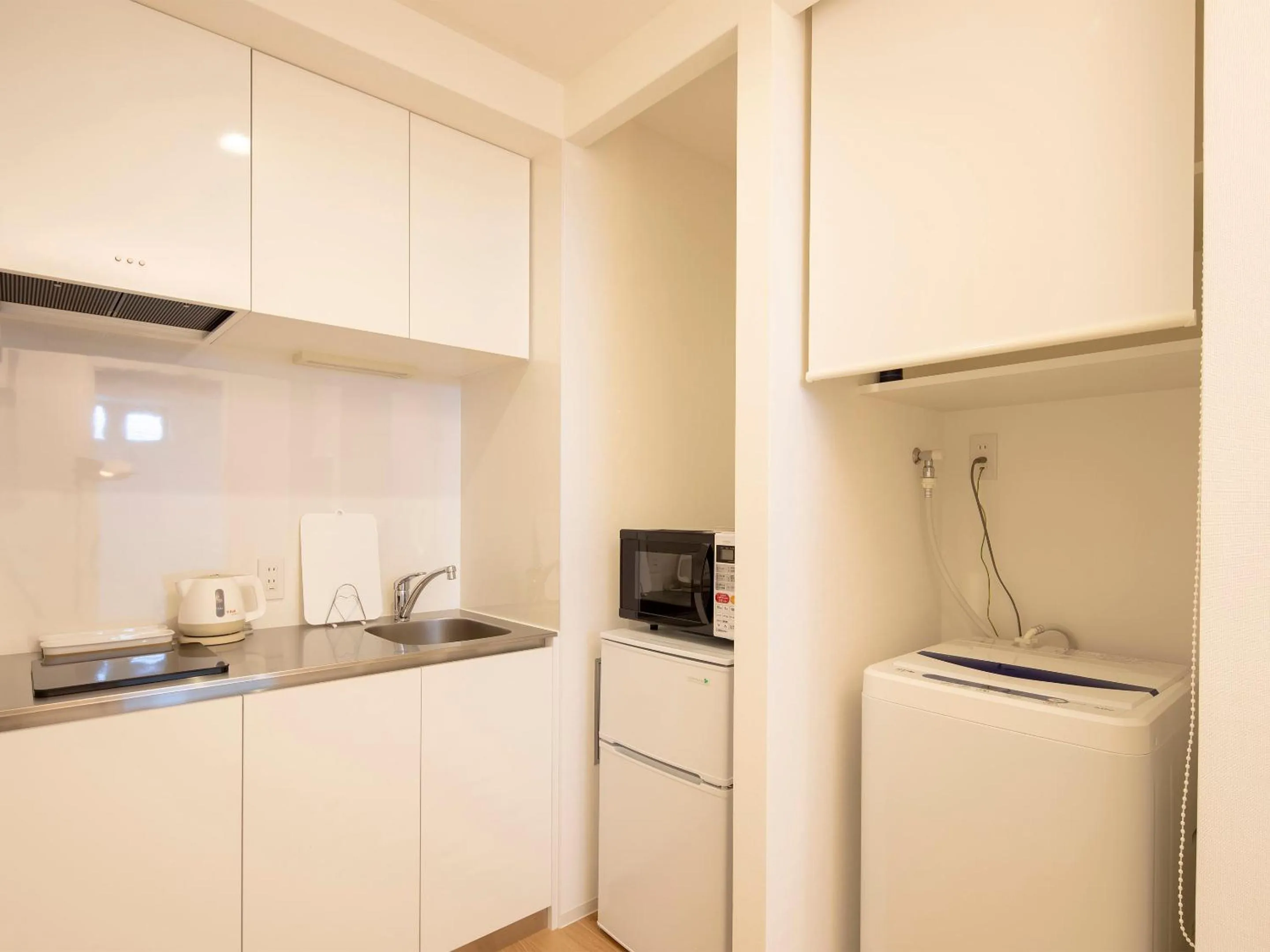 Kitchen or kitchenette in Family Inn Kei 慶