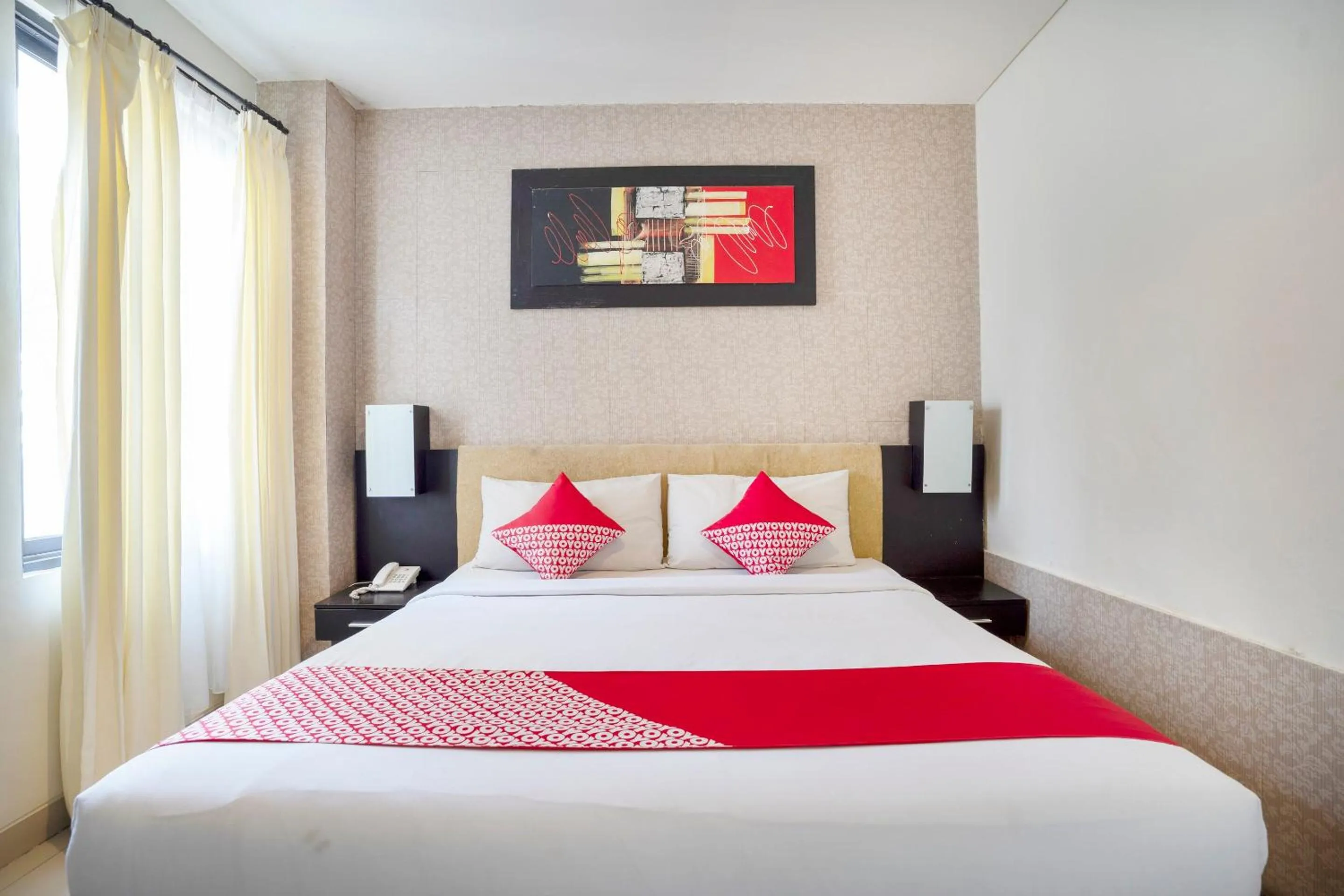 Bedroom in OYO 482 Anika Guest House