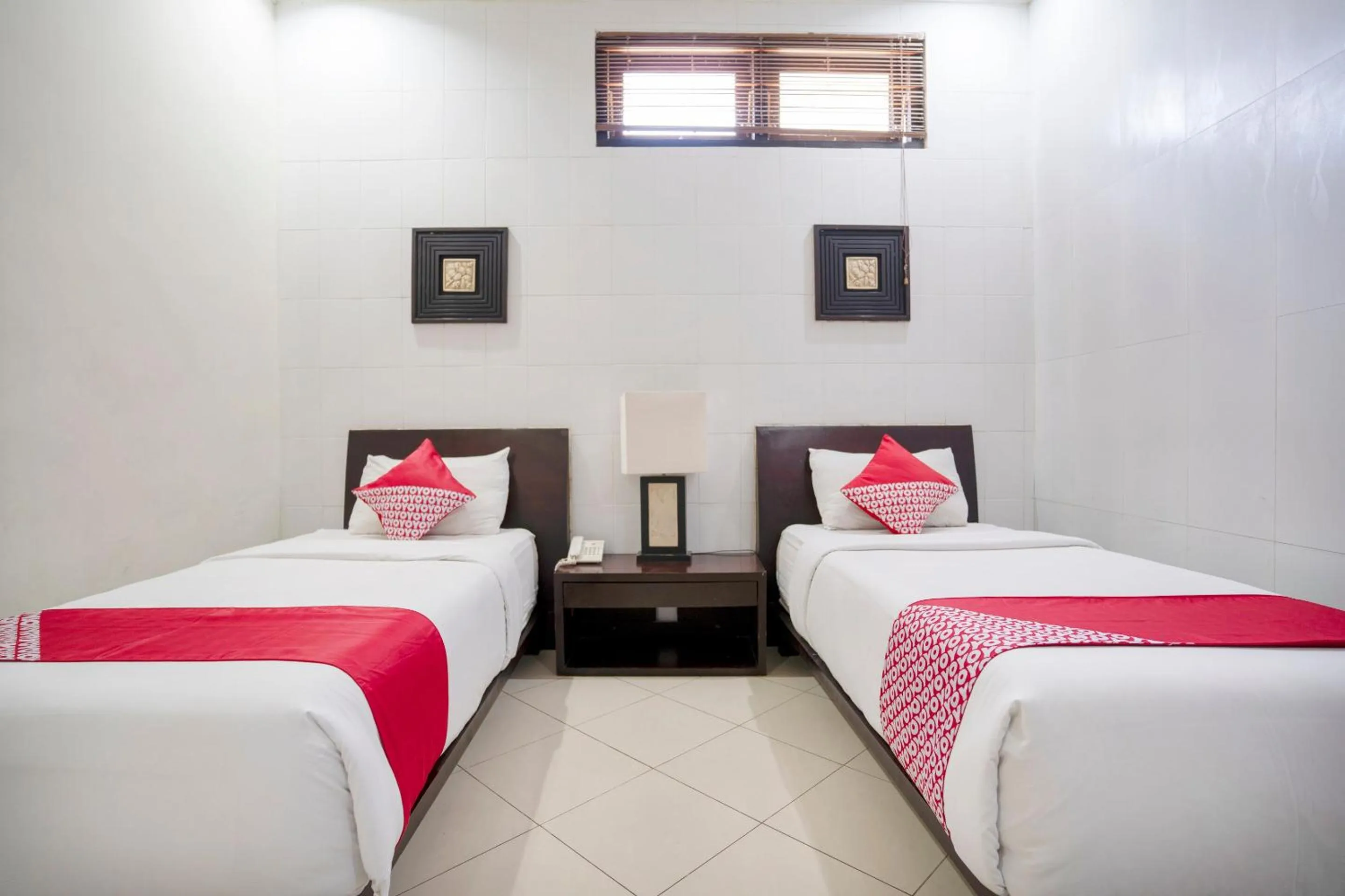 Bedroom in OYO 482 Anika Guest House