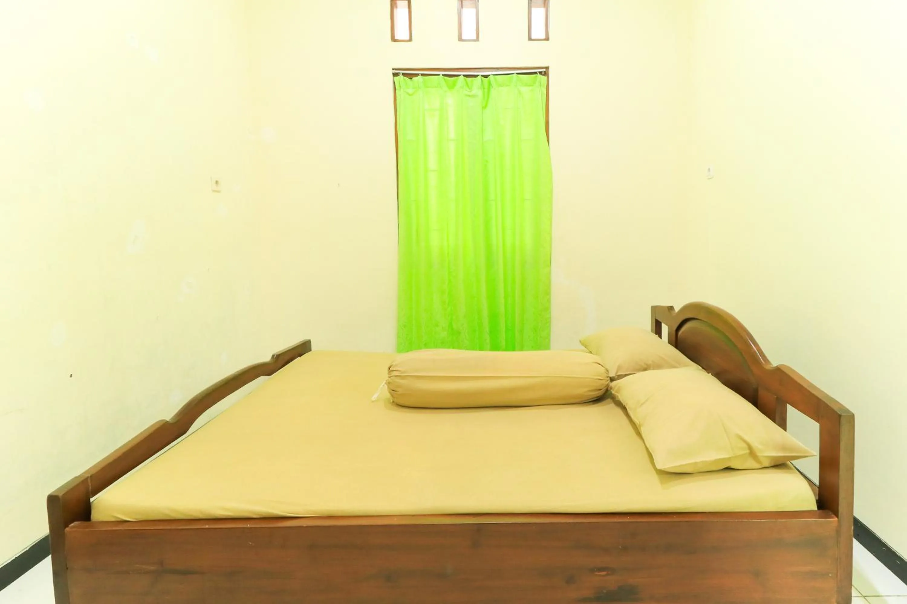 Bed in Villa Kangen Omah