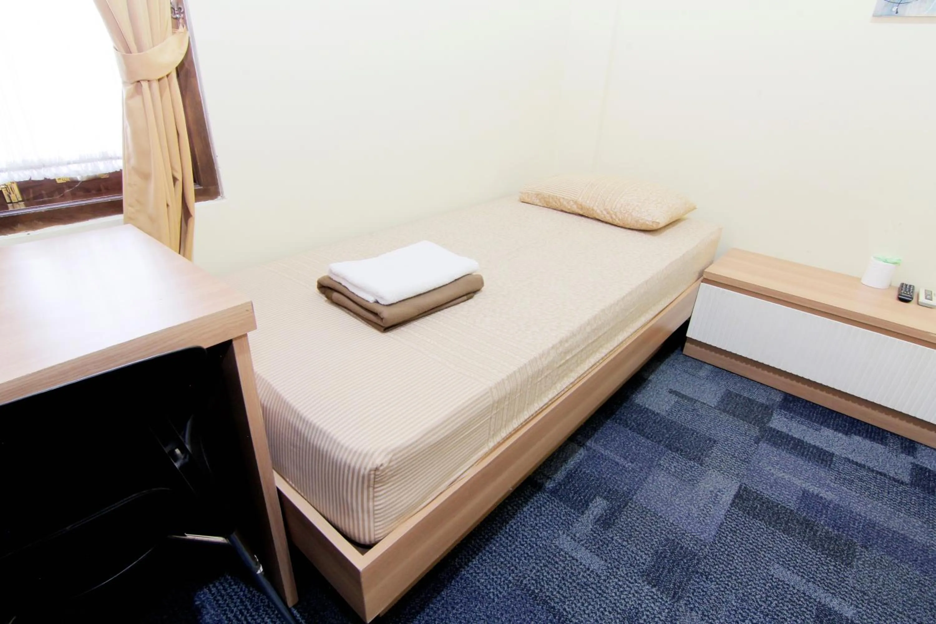 Bed in Embe Joglo Homestay