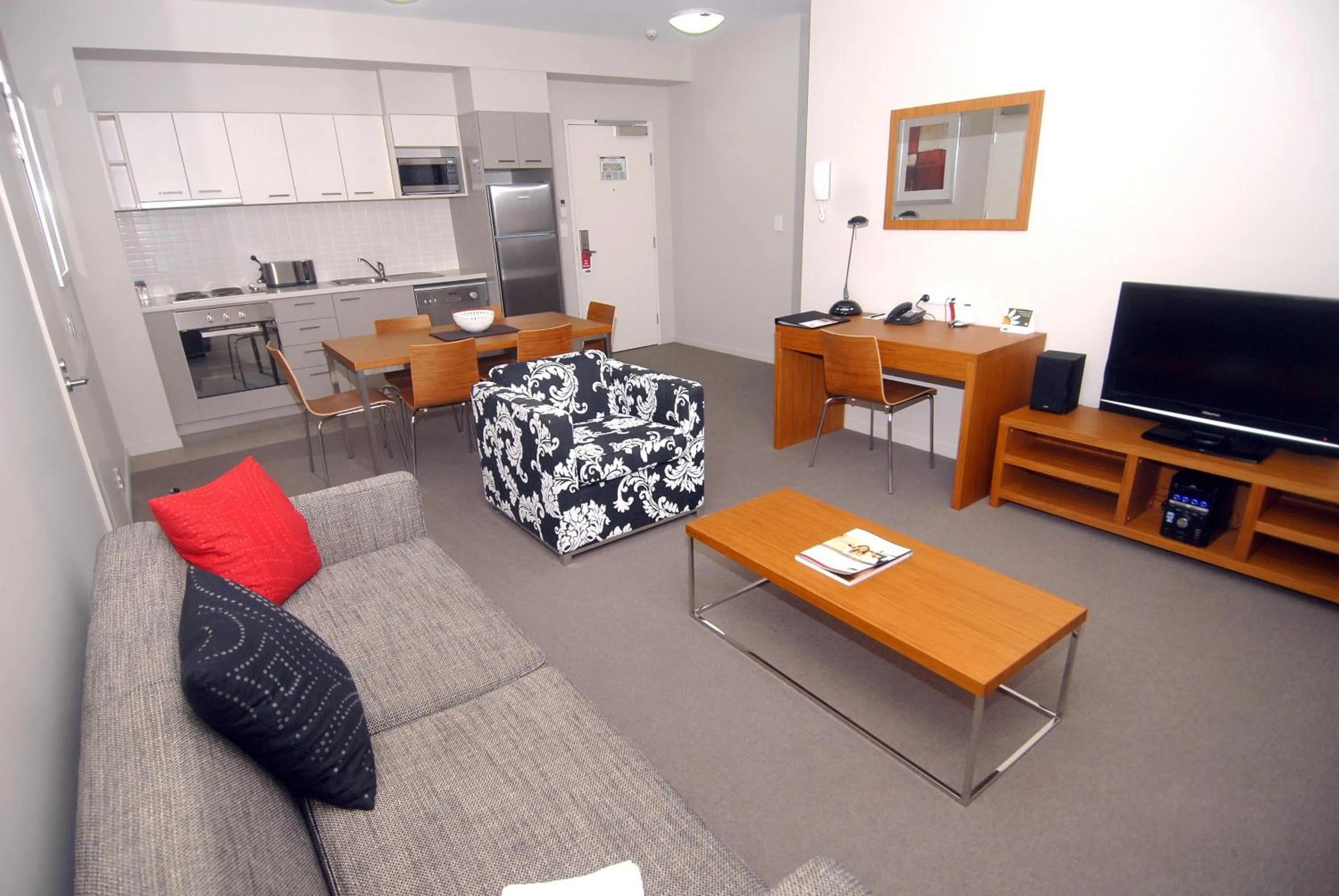 Living room in Gladstone Downtown Central Apartment Hotel Official