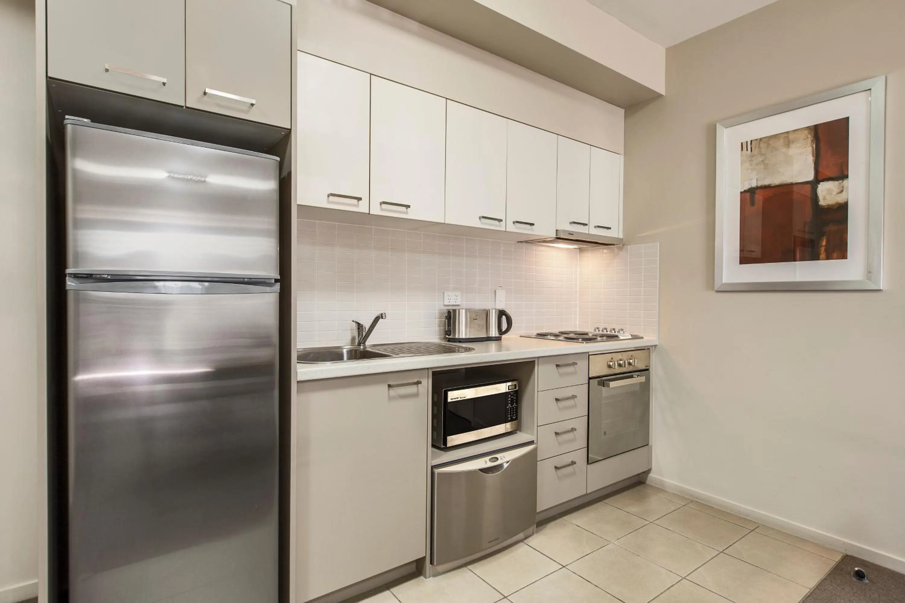 Kitchen or kitchenette in Gladstone Downtown Central Apartment Hotel Official
