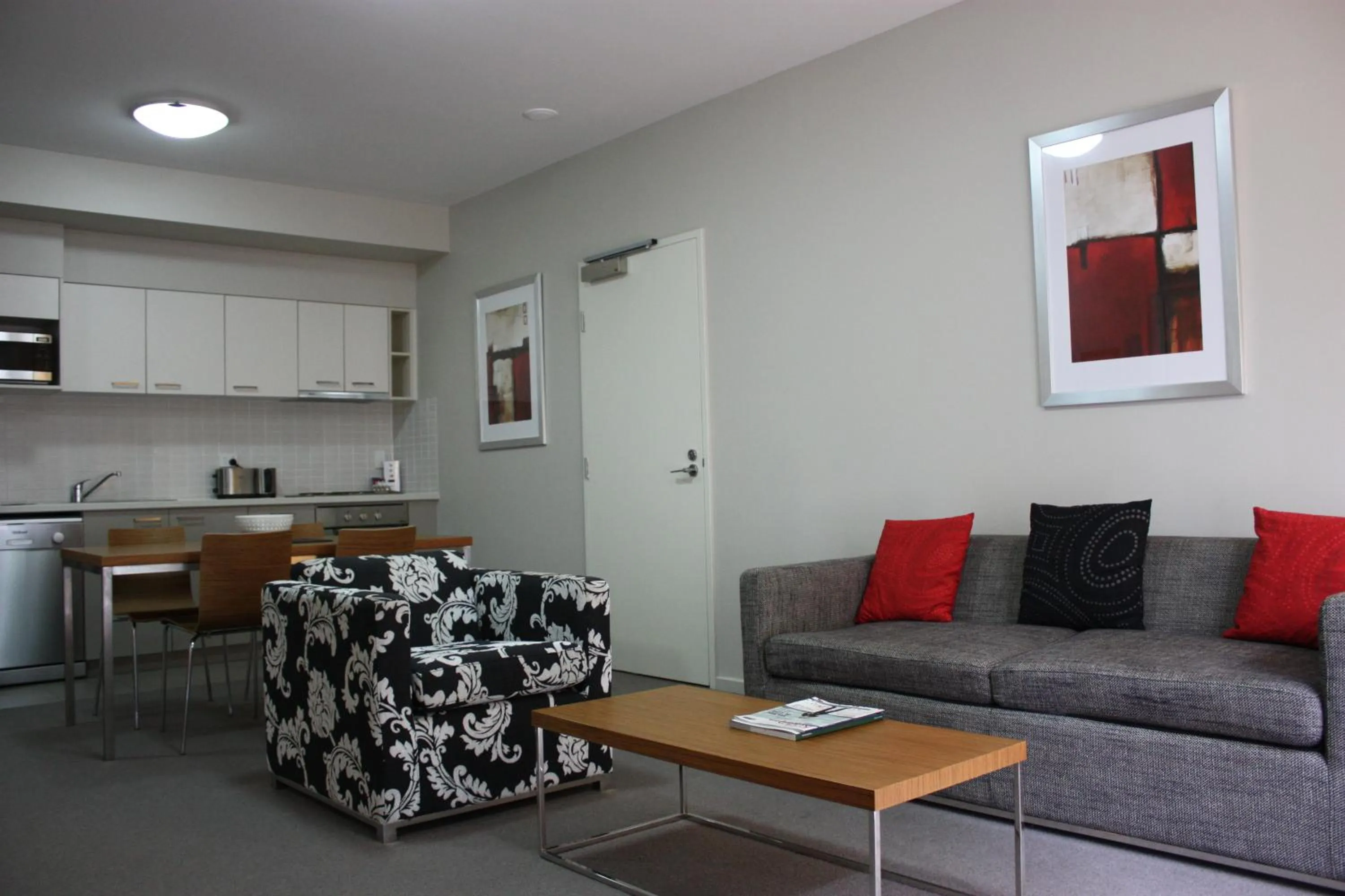 Living room in Gladstone Downtown Central Apartment Hotel Official