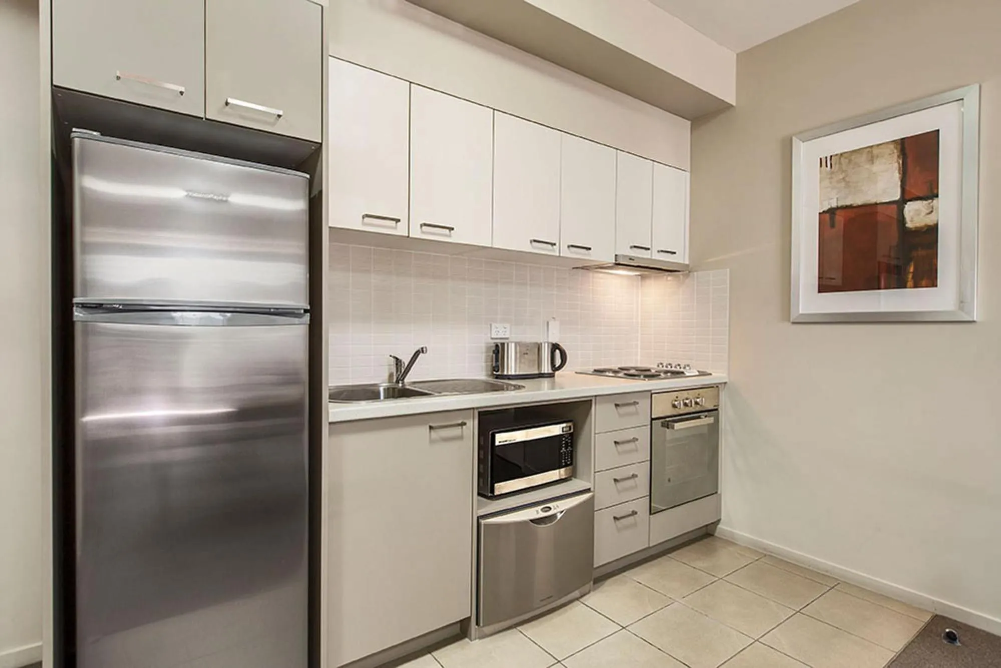 Kitchen or kitchenette in Gladstone Downtown Central Apartment Hotel Official