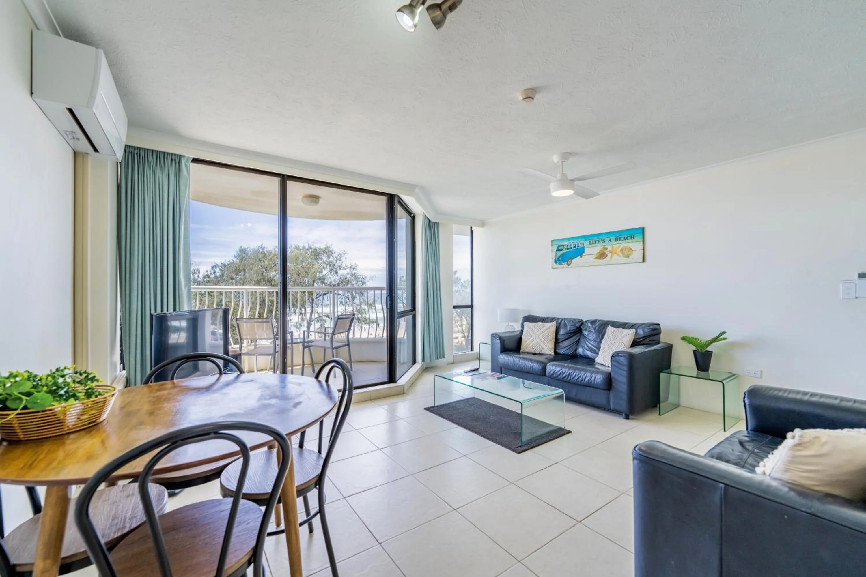 Living room in Olympus Beachfront Apartments