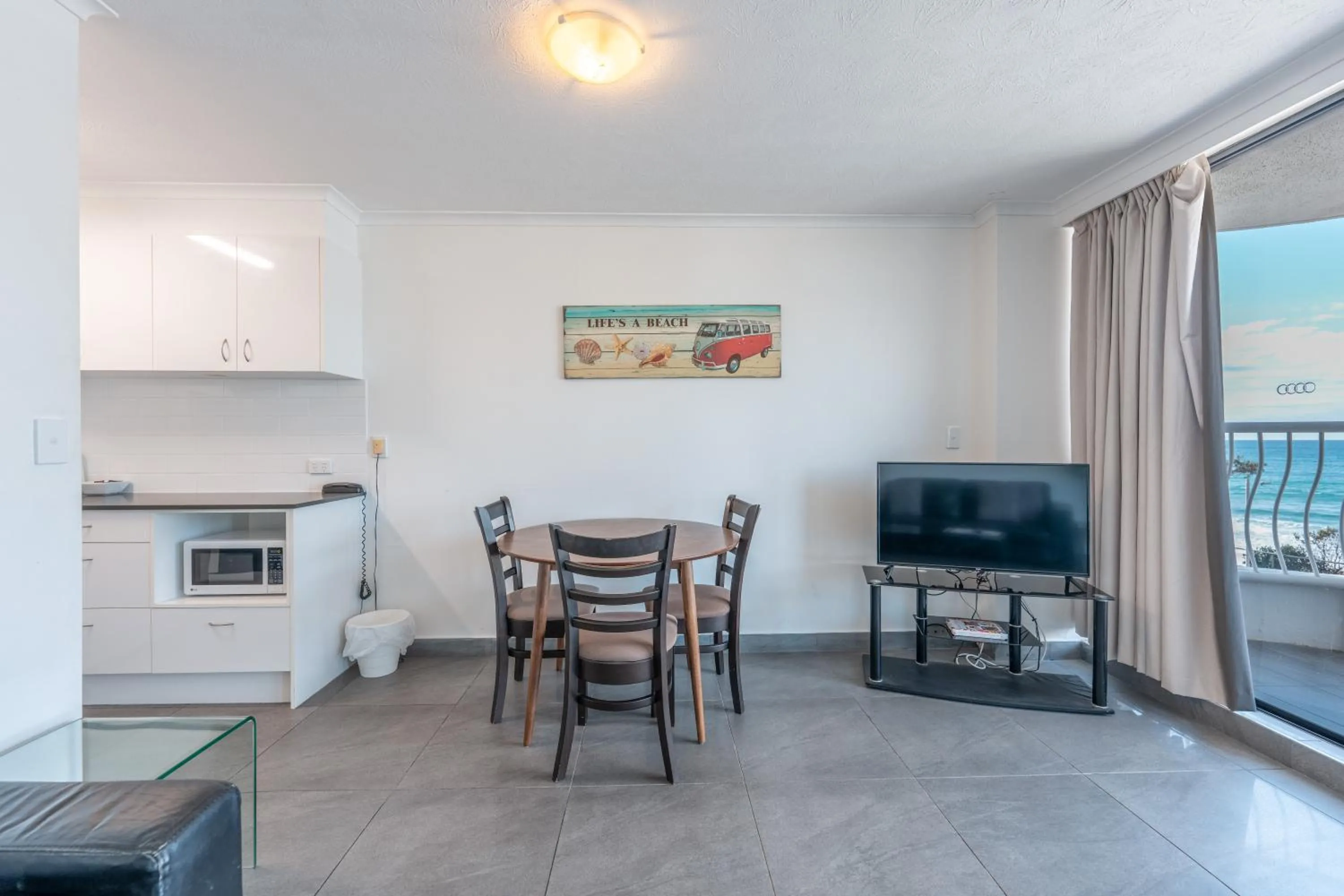Living room in Olympus Beachfront Apartments