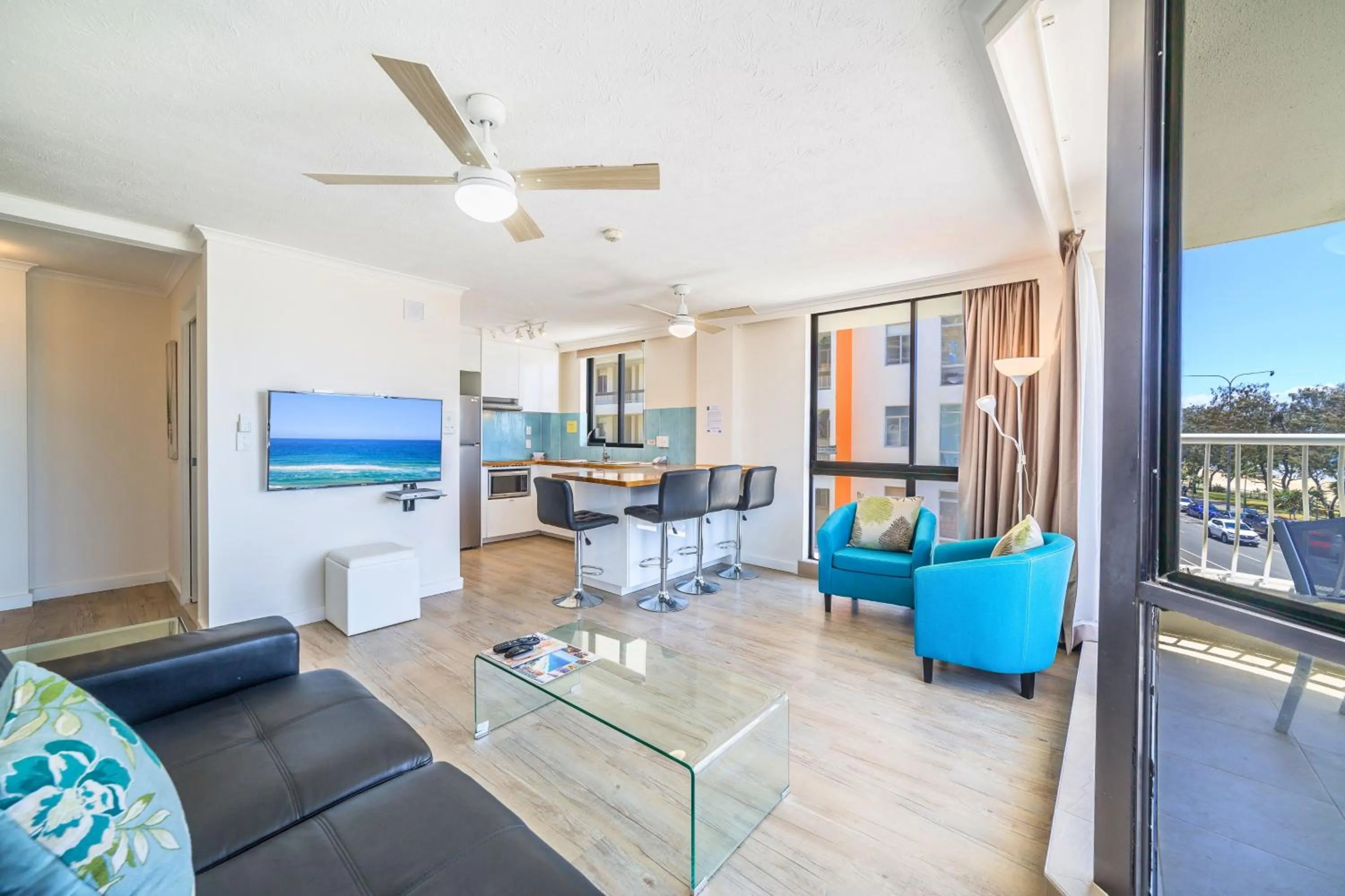 Living room in Olympus Beachfront Apartments