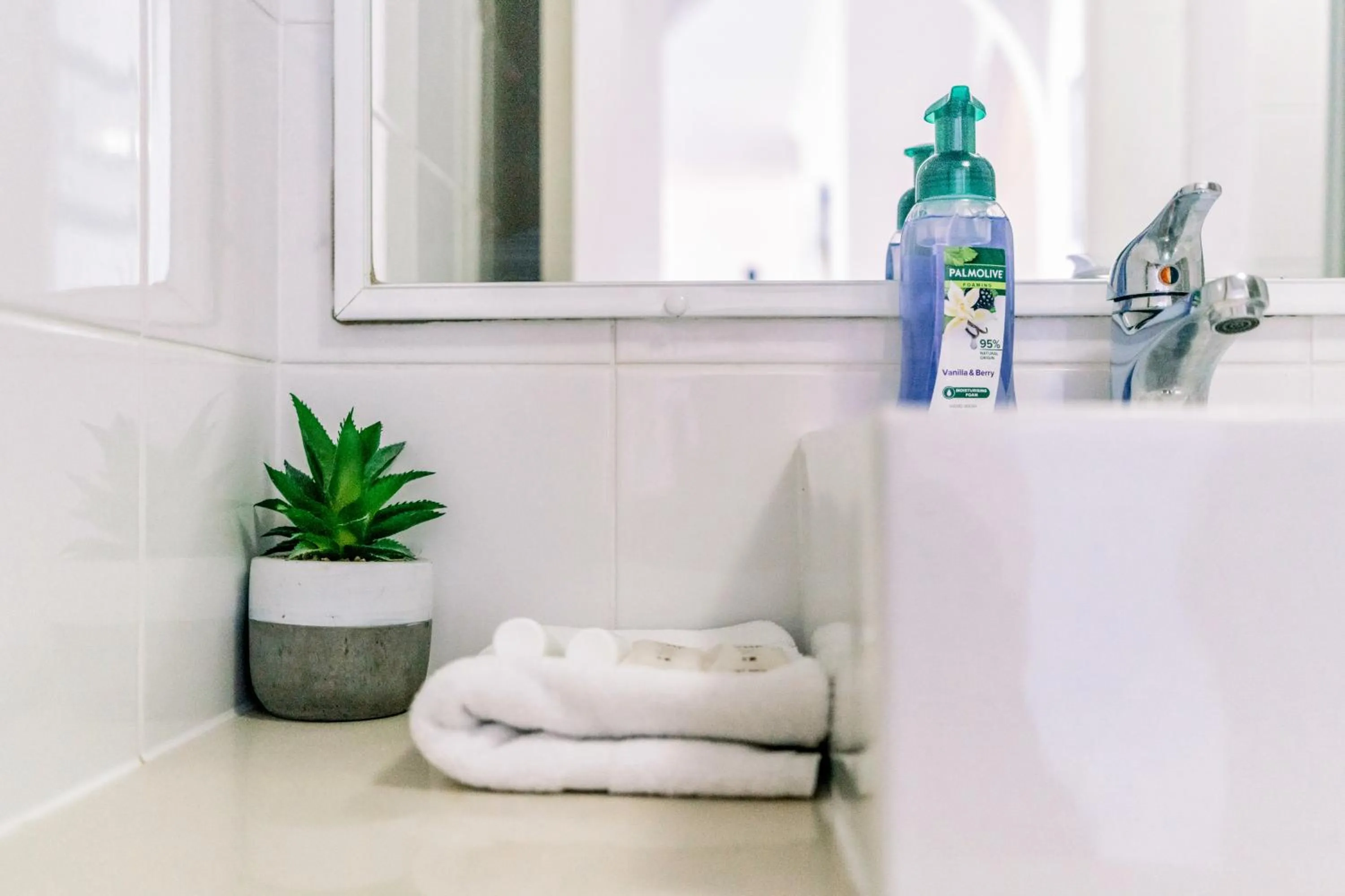 Bathroom in Olympus Beachfront Apartments