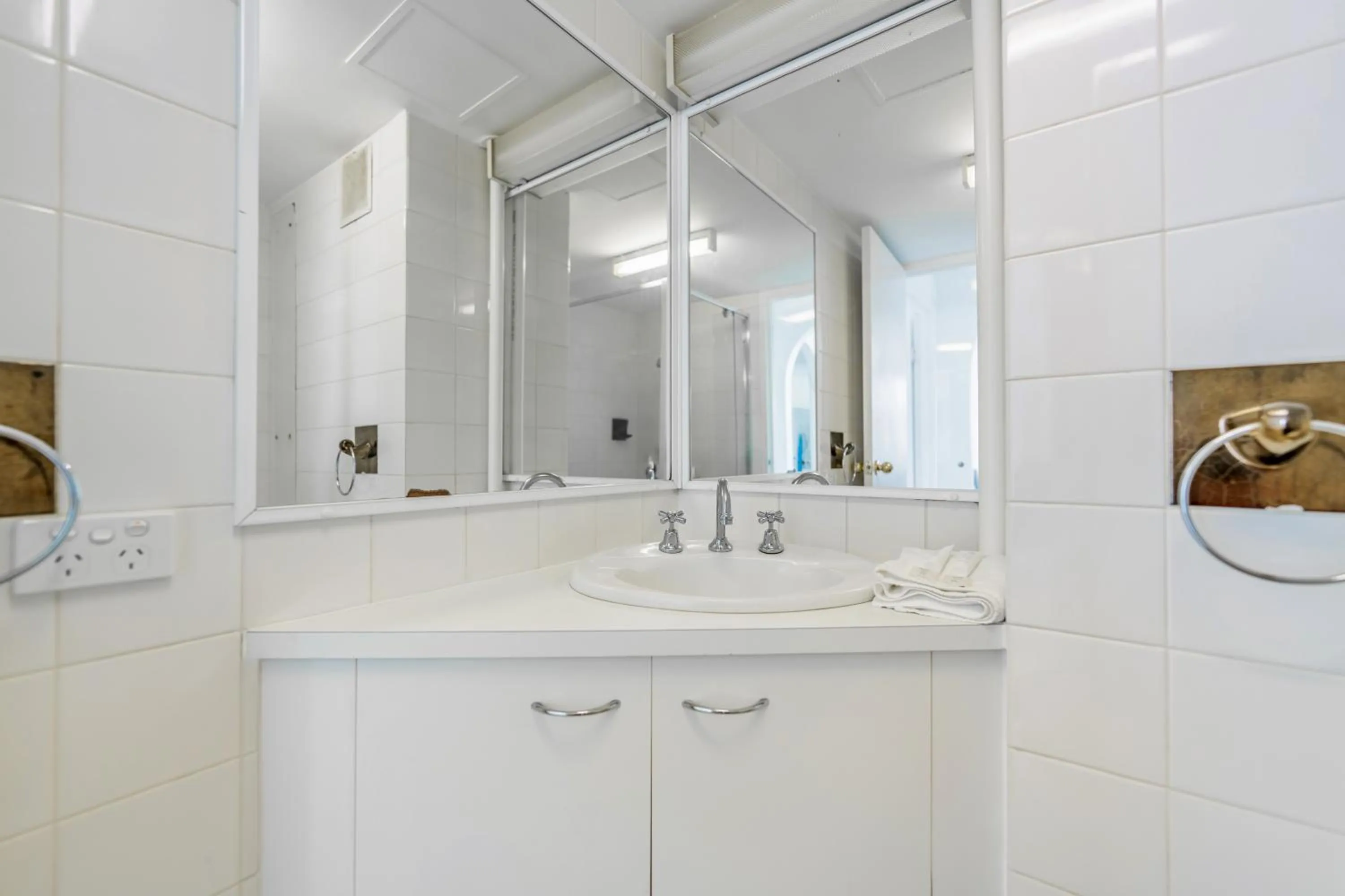 Bathroom in Olympus Beachfront Apartments