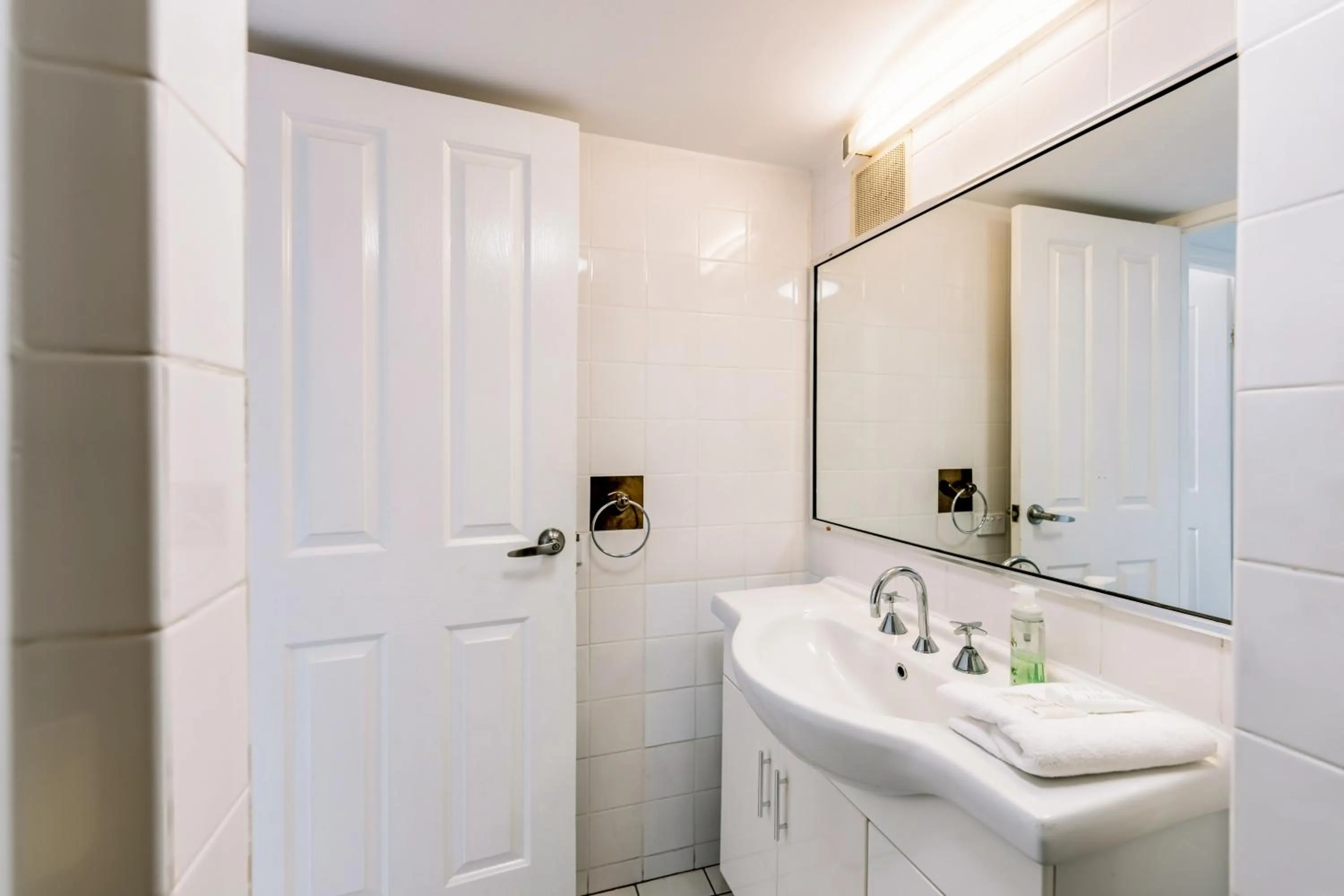 Bathroom in Olympus Beachfront Apartments