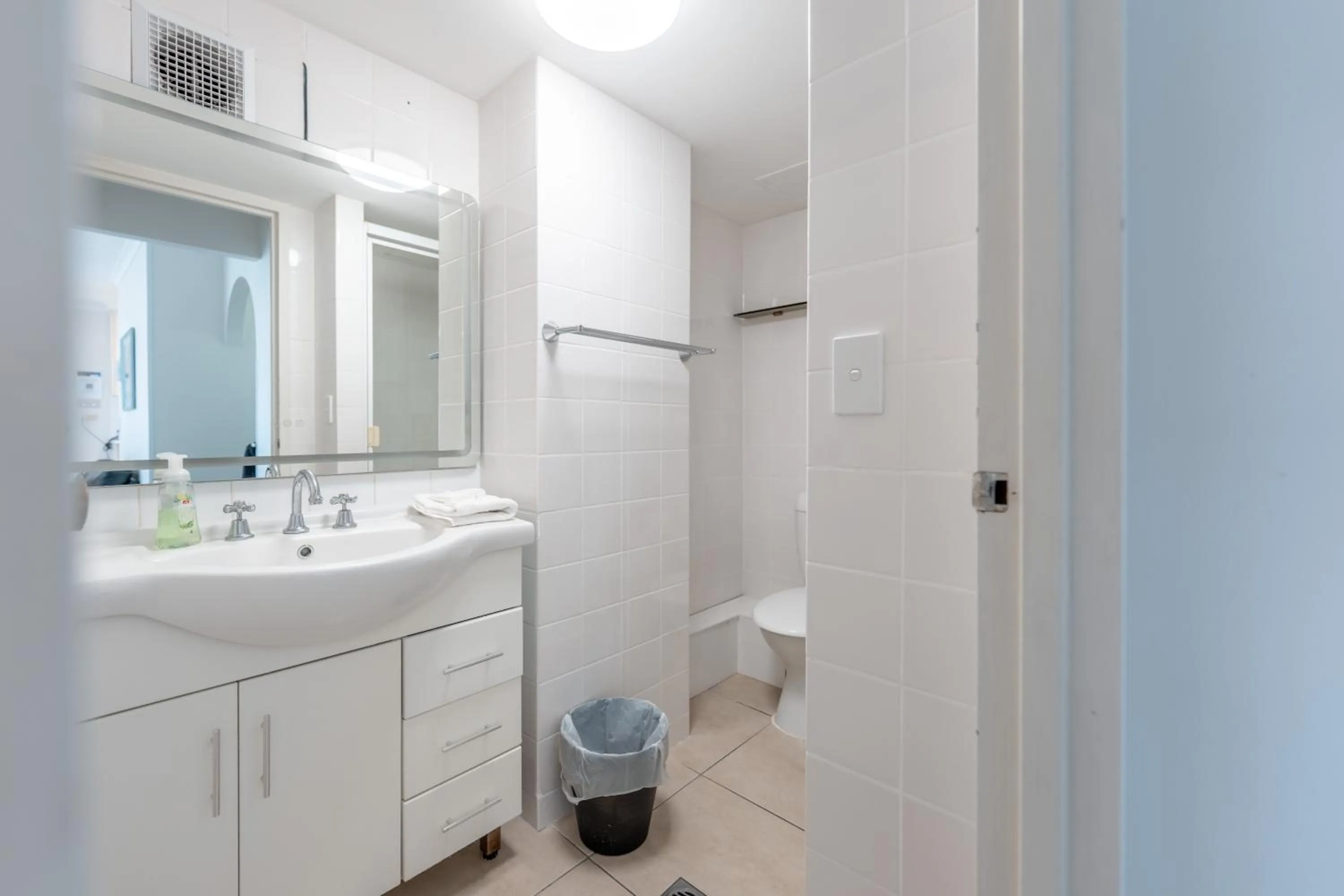 Bathroom in Olympus Beachfront Apartments