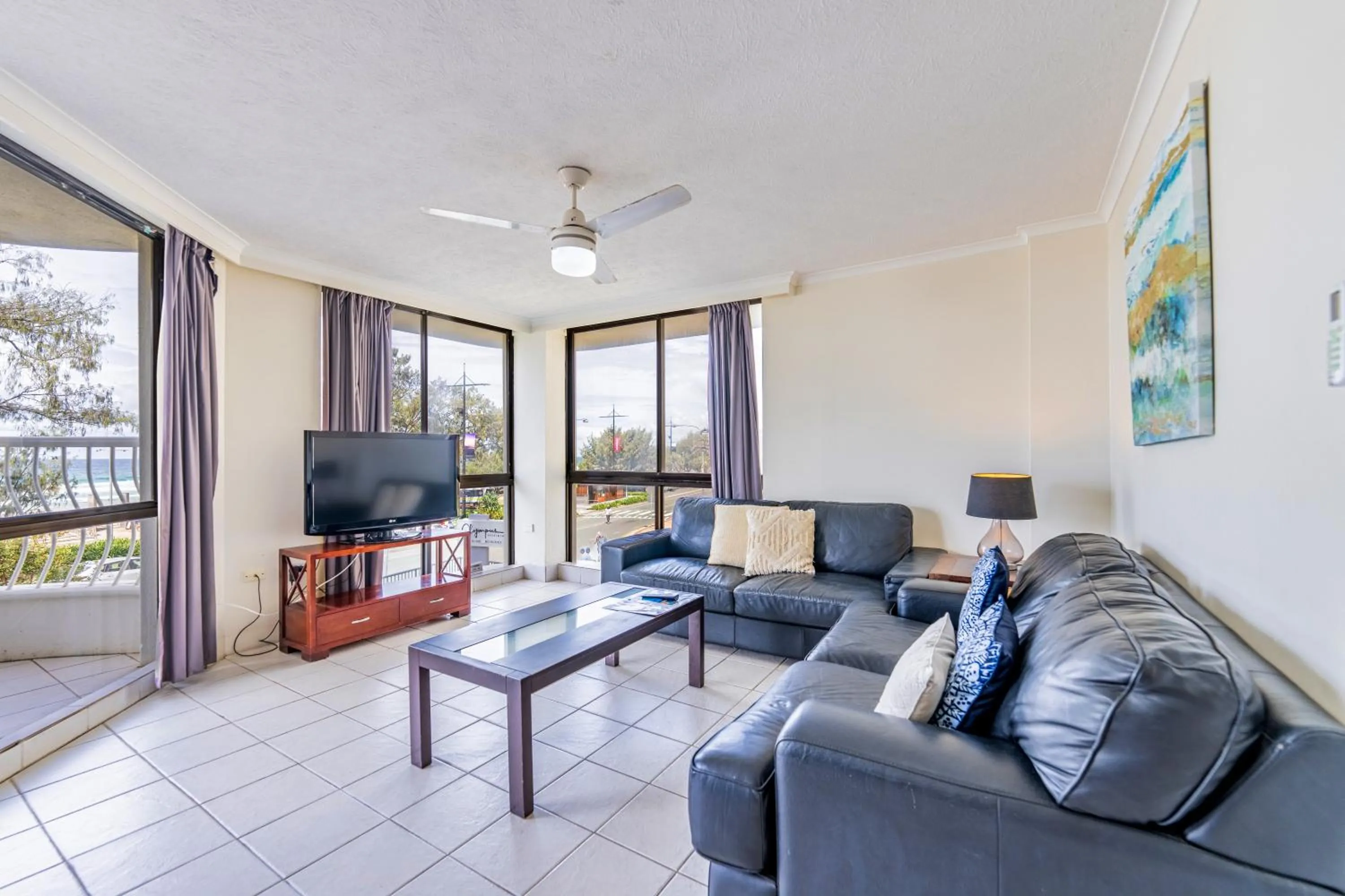 Living room in Olympus Beachfront Apartments