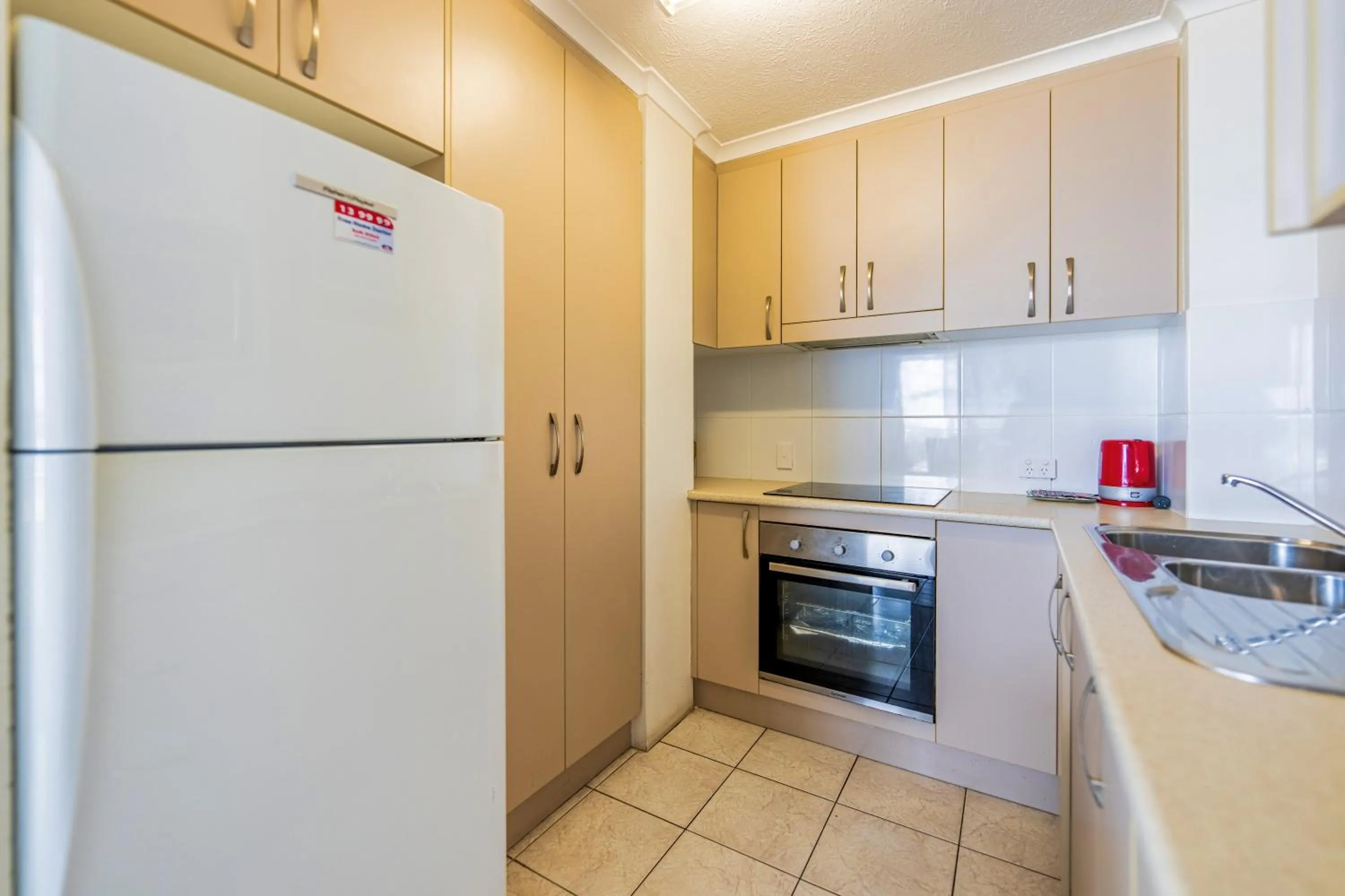 kitchen in Olympus Beachfront Apartments