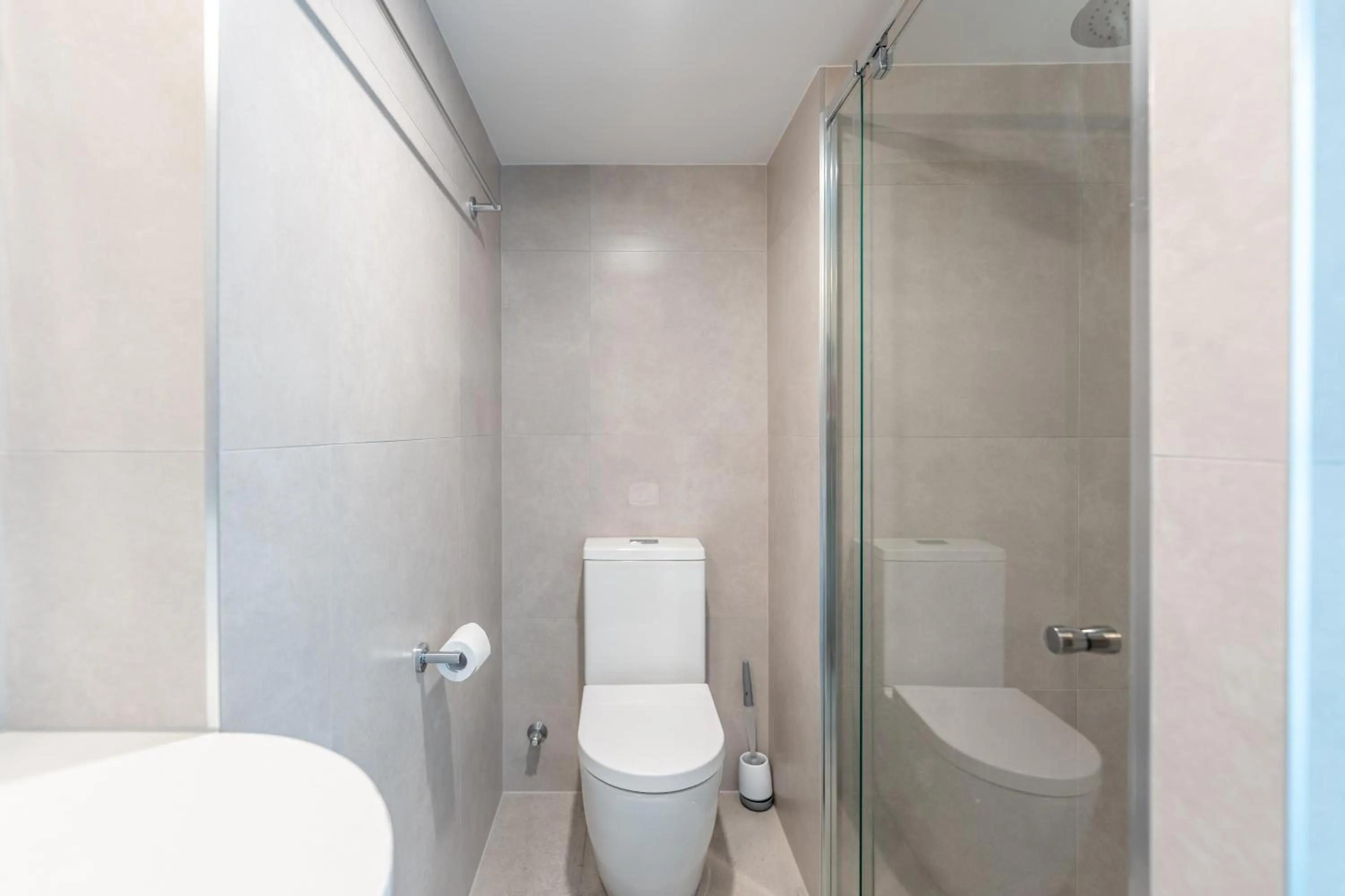 Bathroom in Olympus Beachfront Apartments