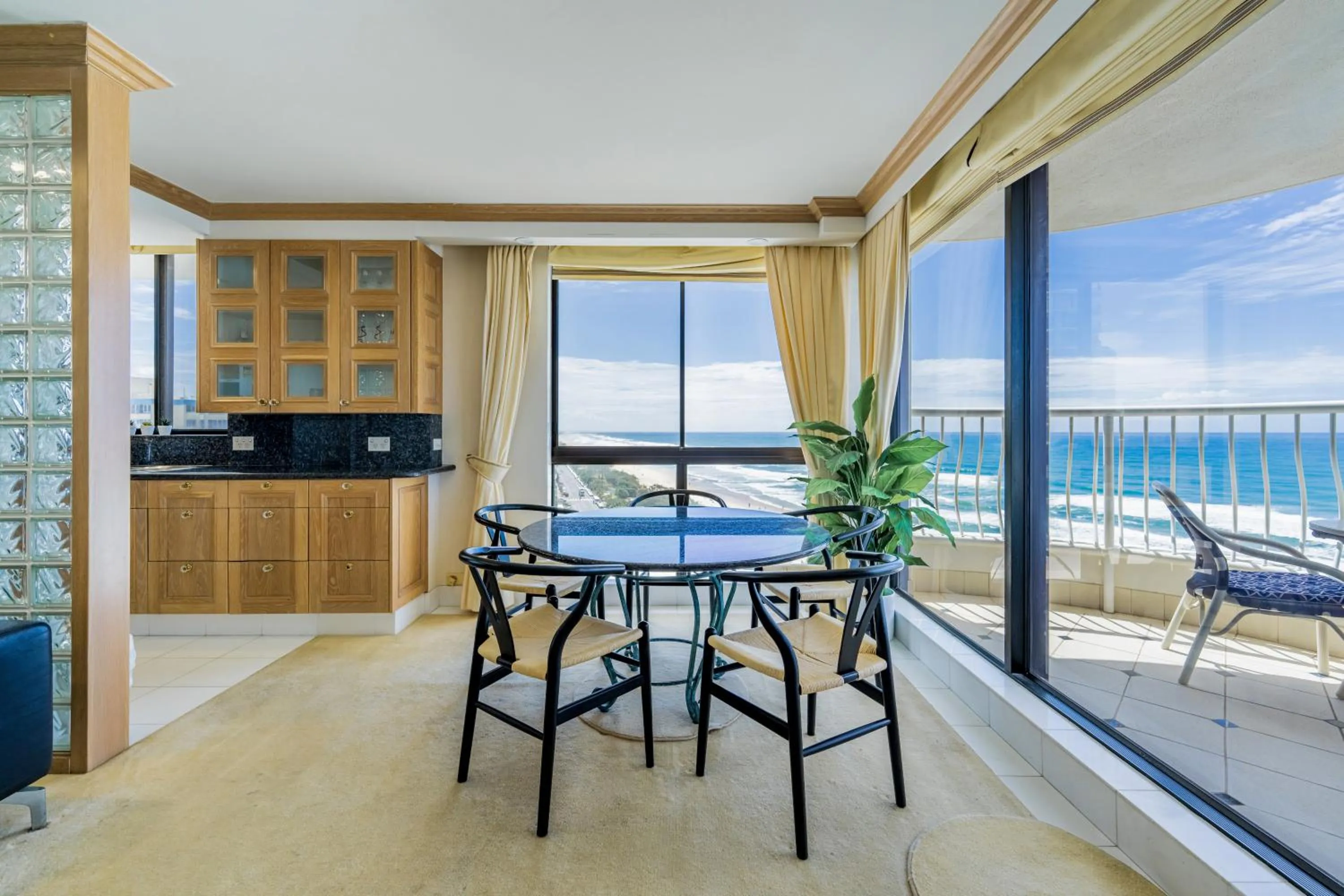Dining area in Olympus Beachfront Apartments
