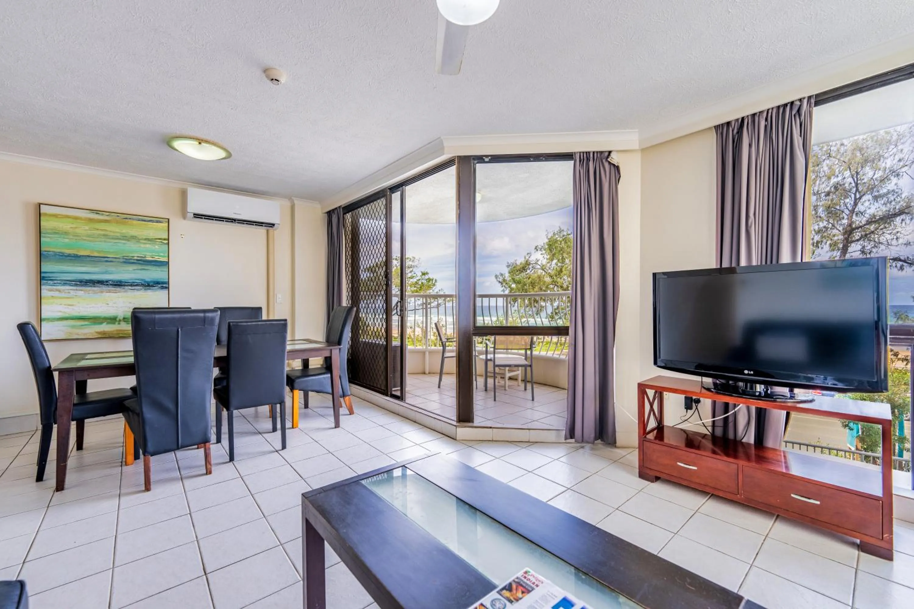 Dining area in Olympus Beachfront Apartments