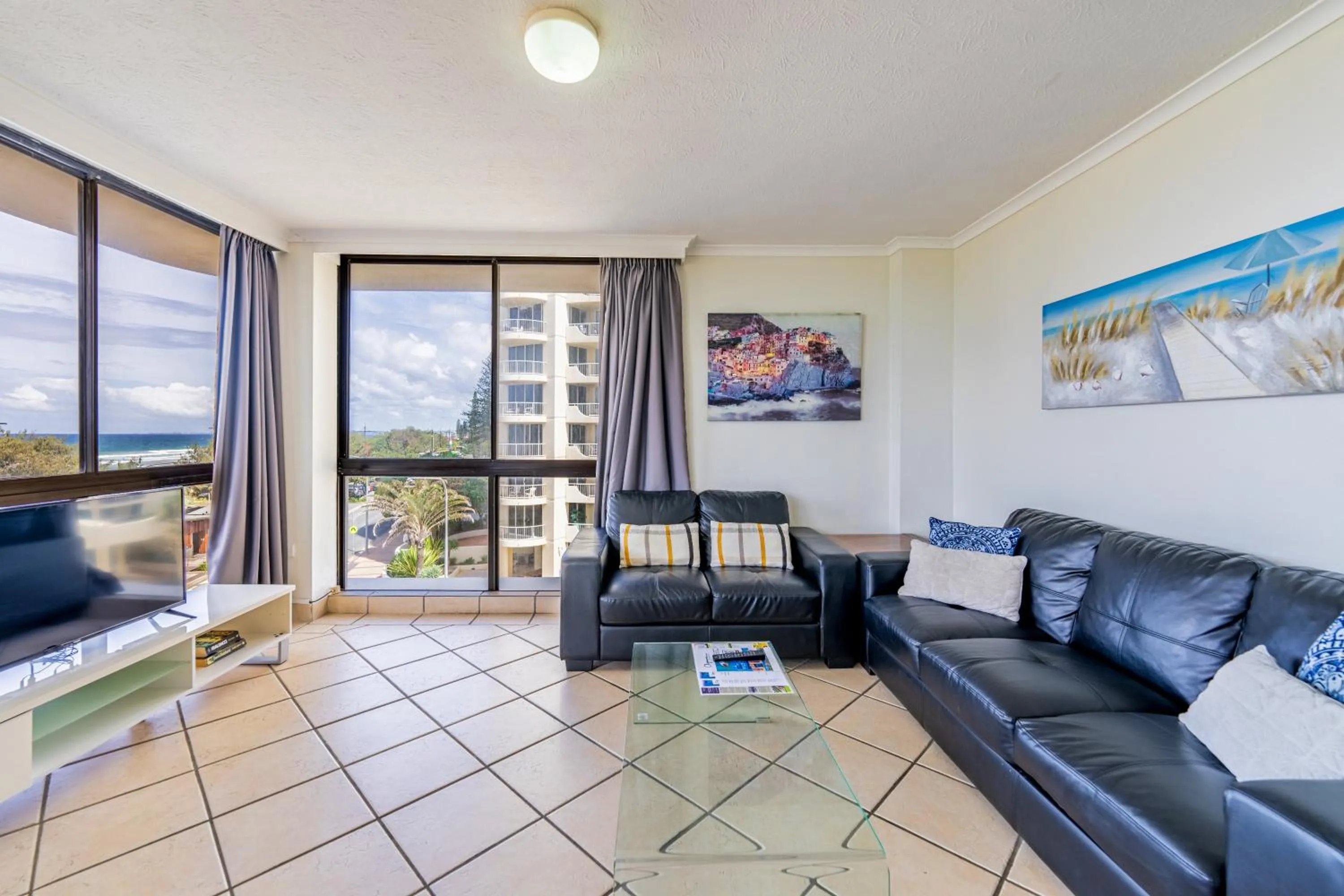 Living room in Olympus Beachfront Apartments