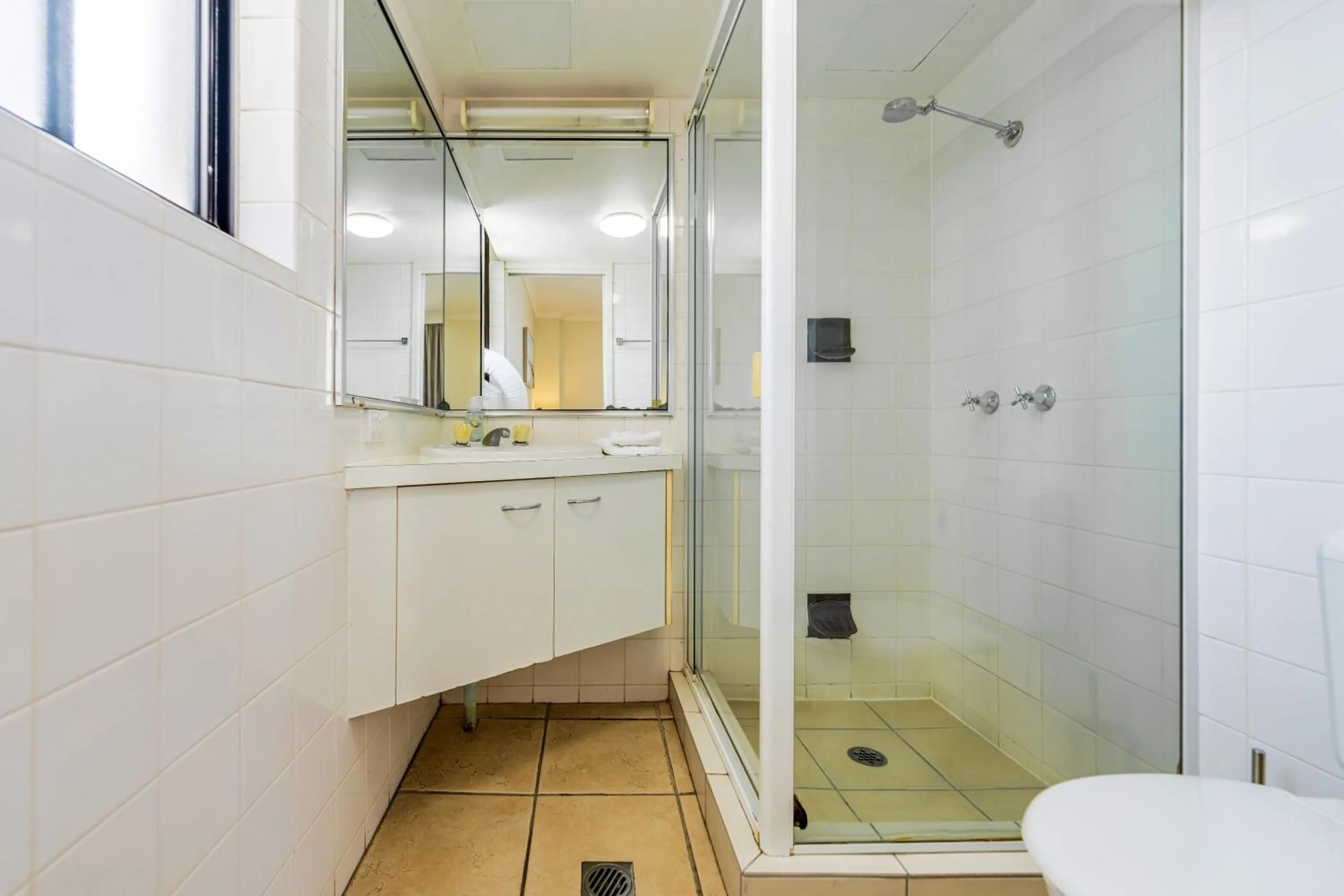 Bathroom in Olympus Beachfront Apartments