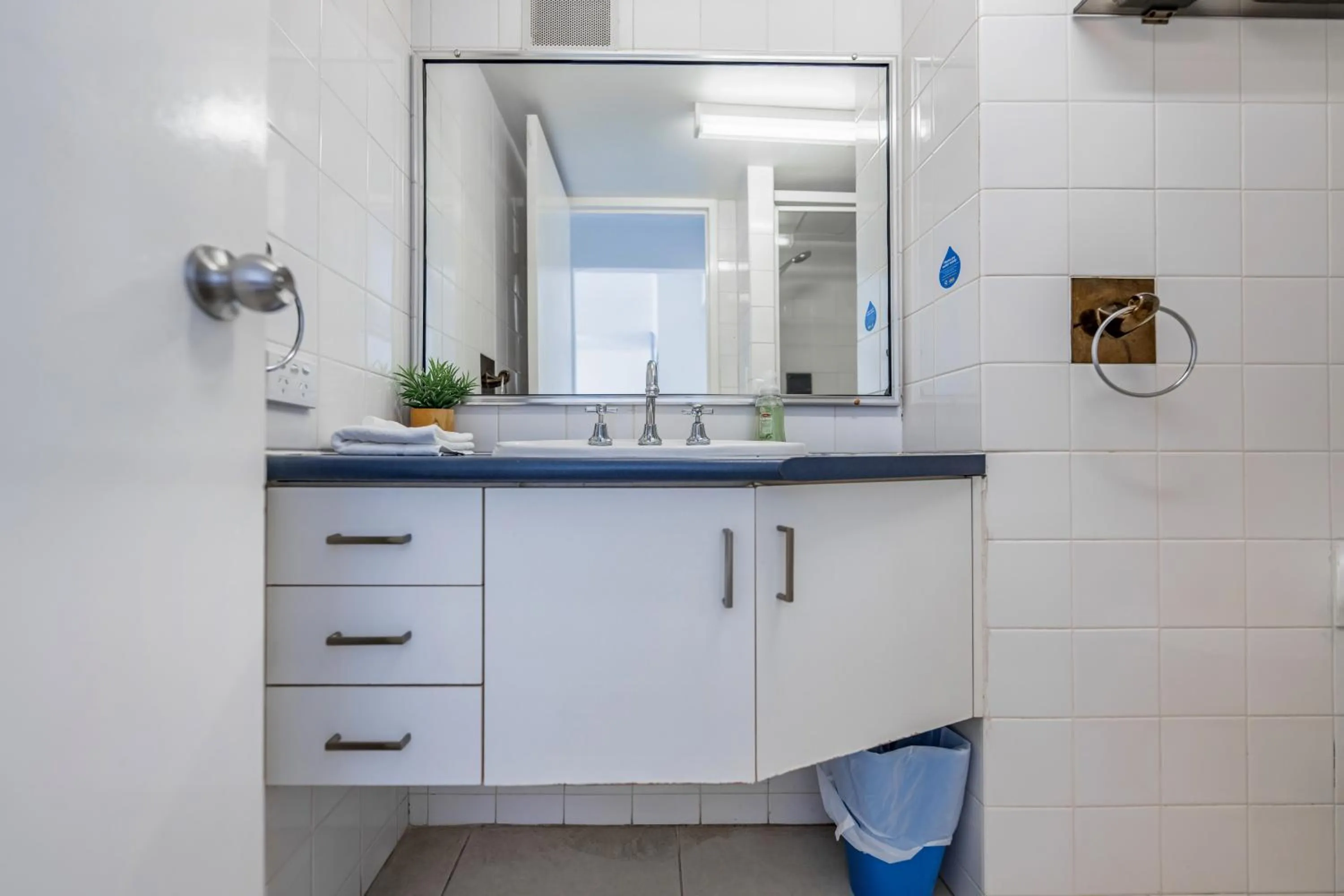 Bathroom in Olympus Beachfront Apartments