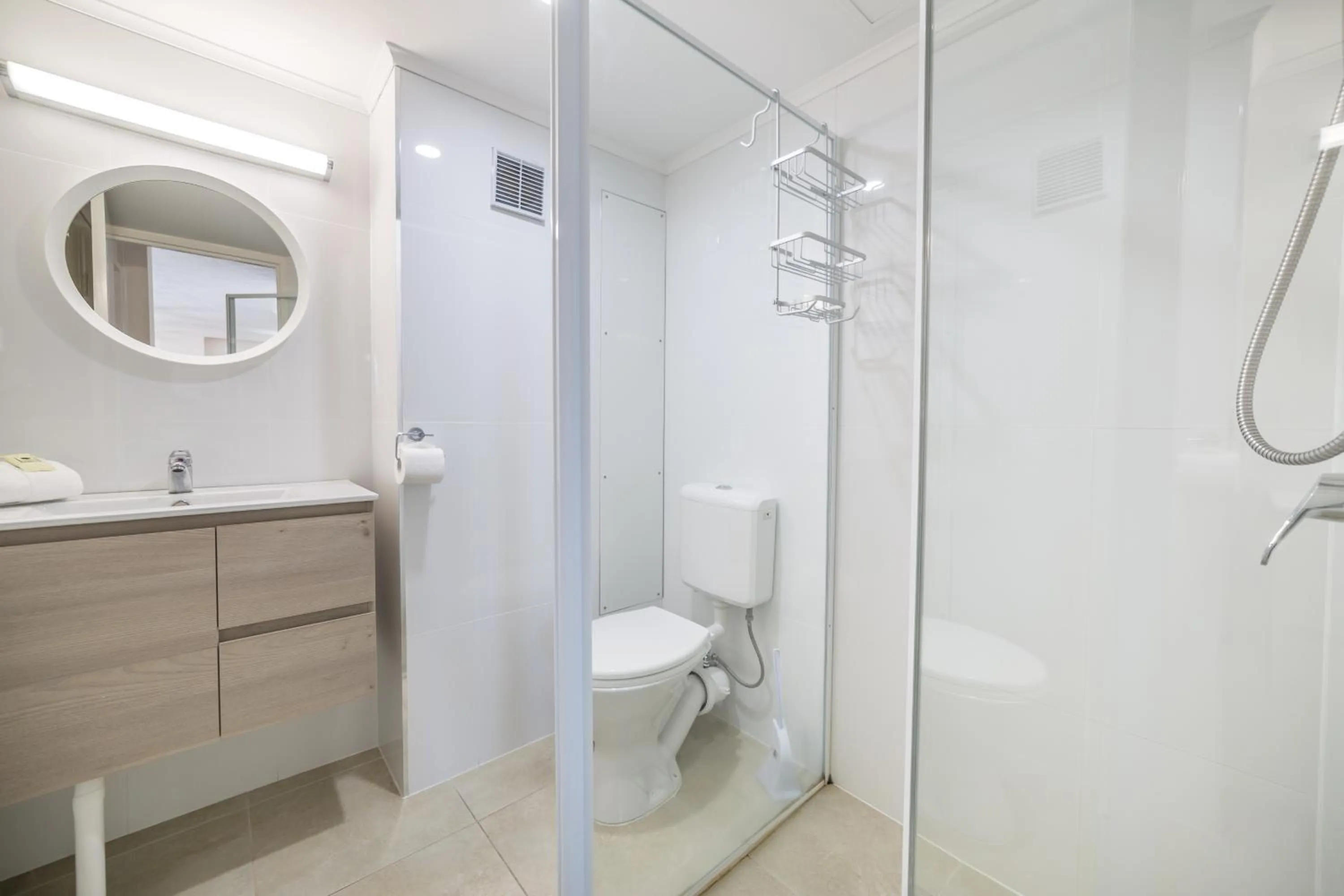 Bathroom in Olympus Beachfront Apartments