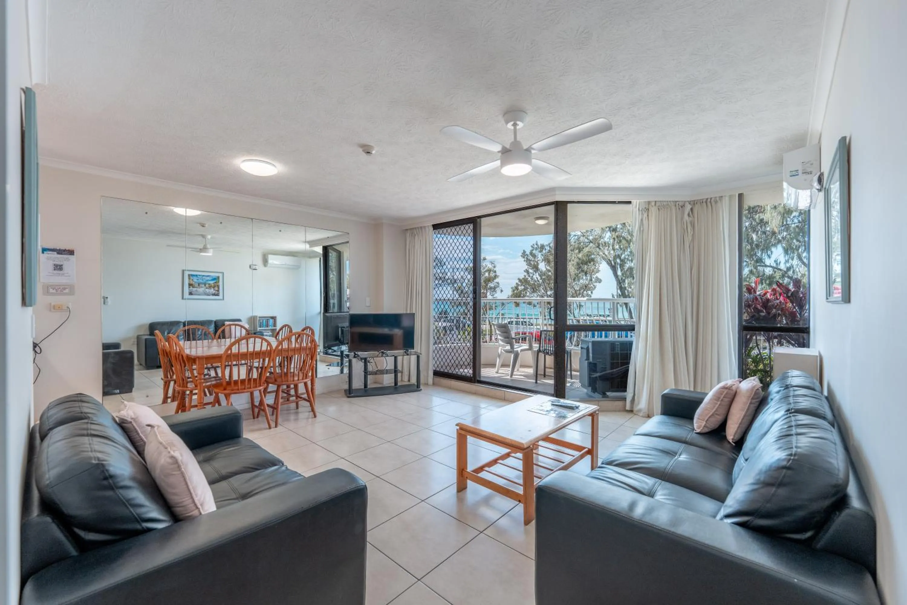 Living room in Olympus Beachfront Apartments