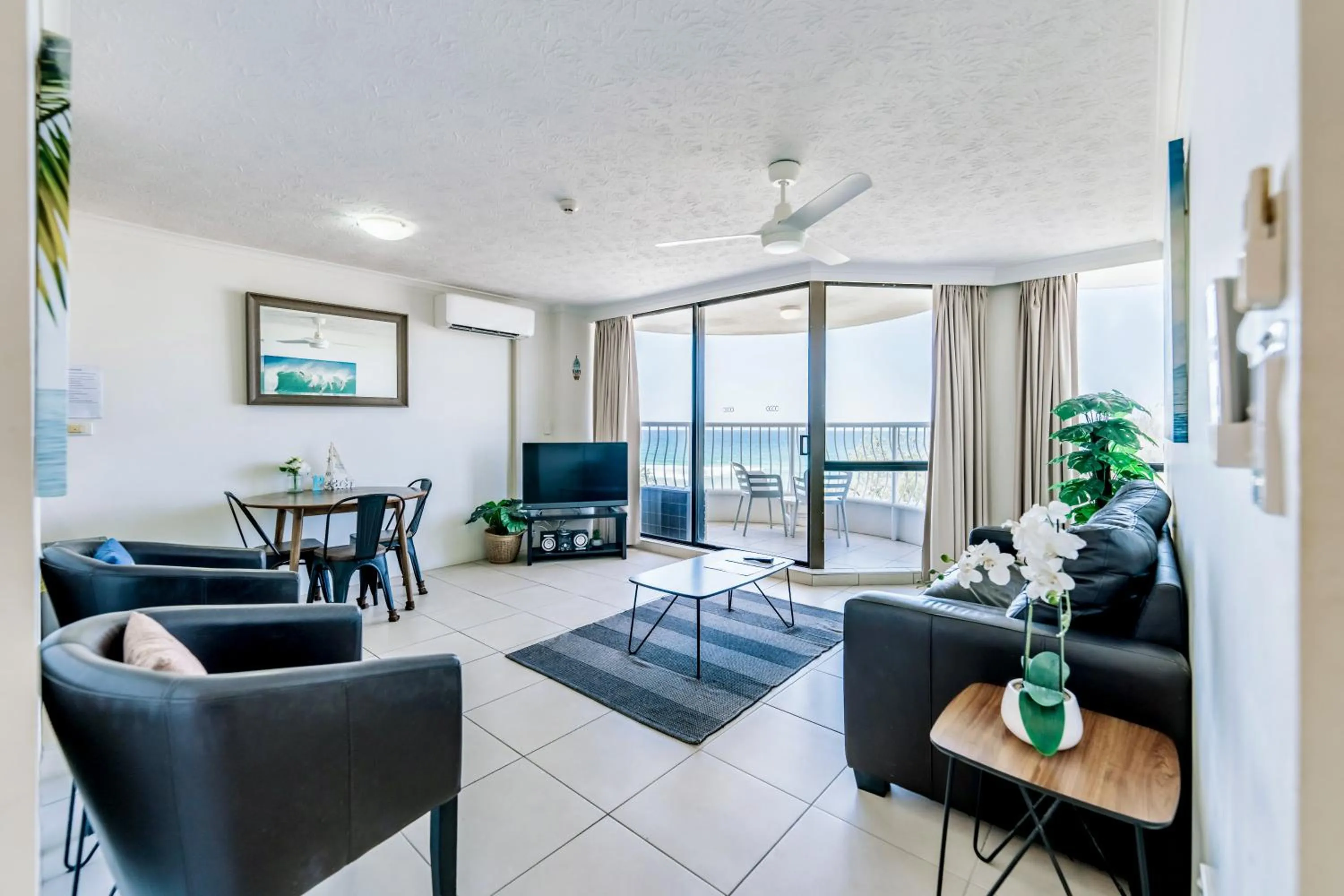 Living room in Olympus Beachfront Apartments