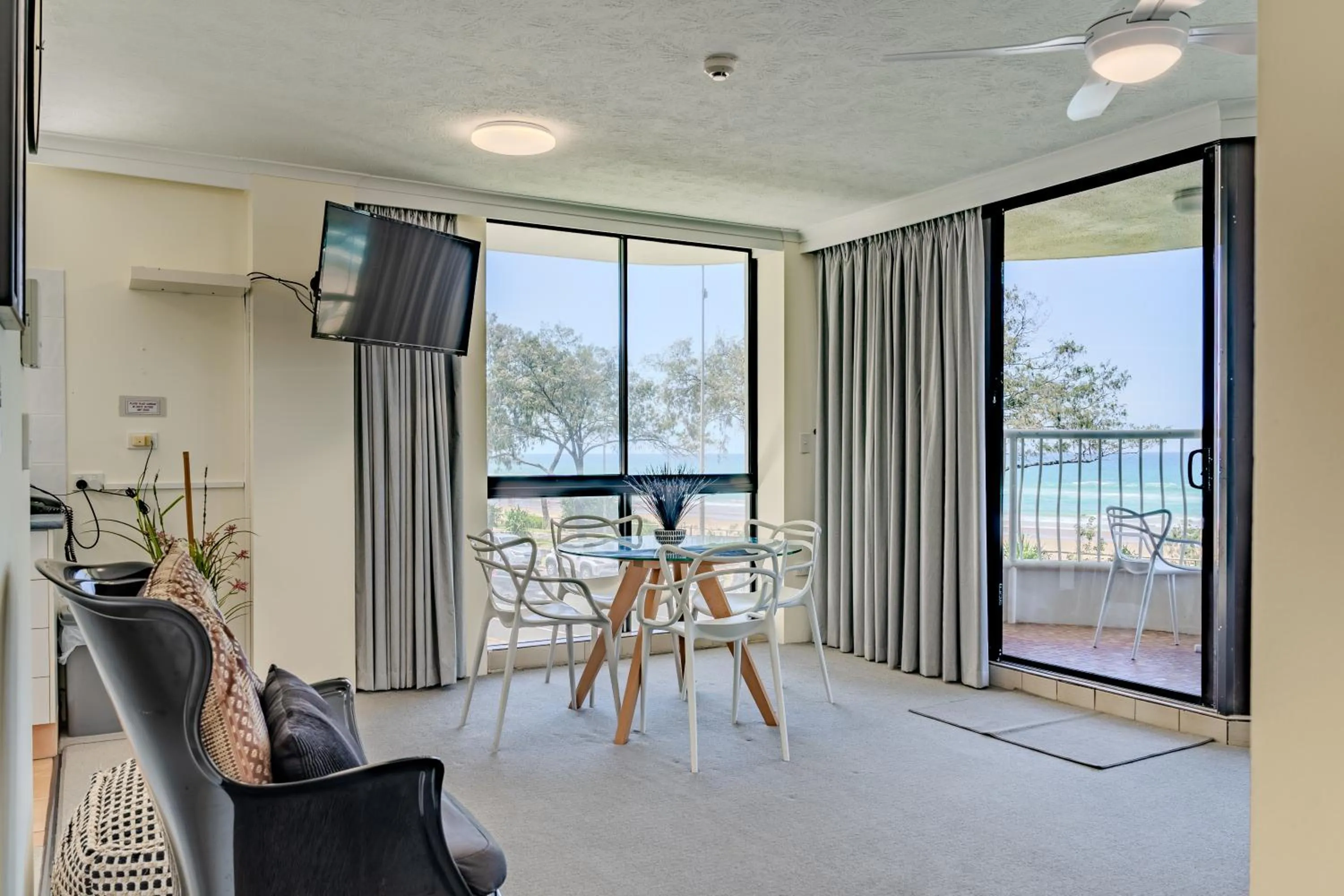 Dining area in Olympus Beachfront Apartments