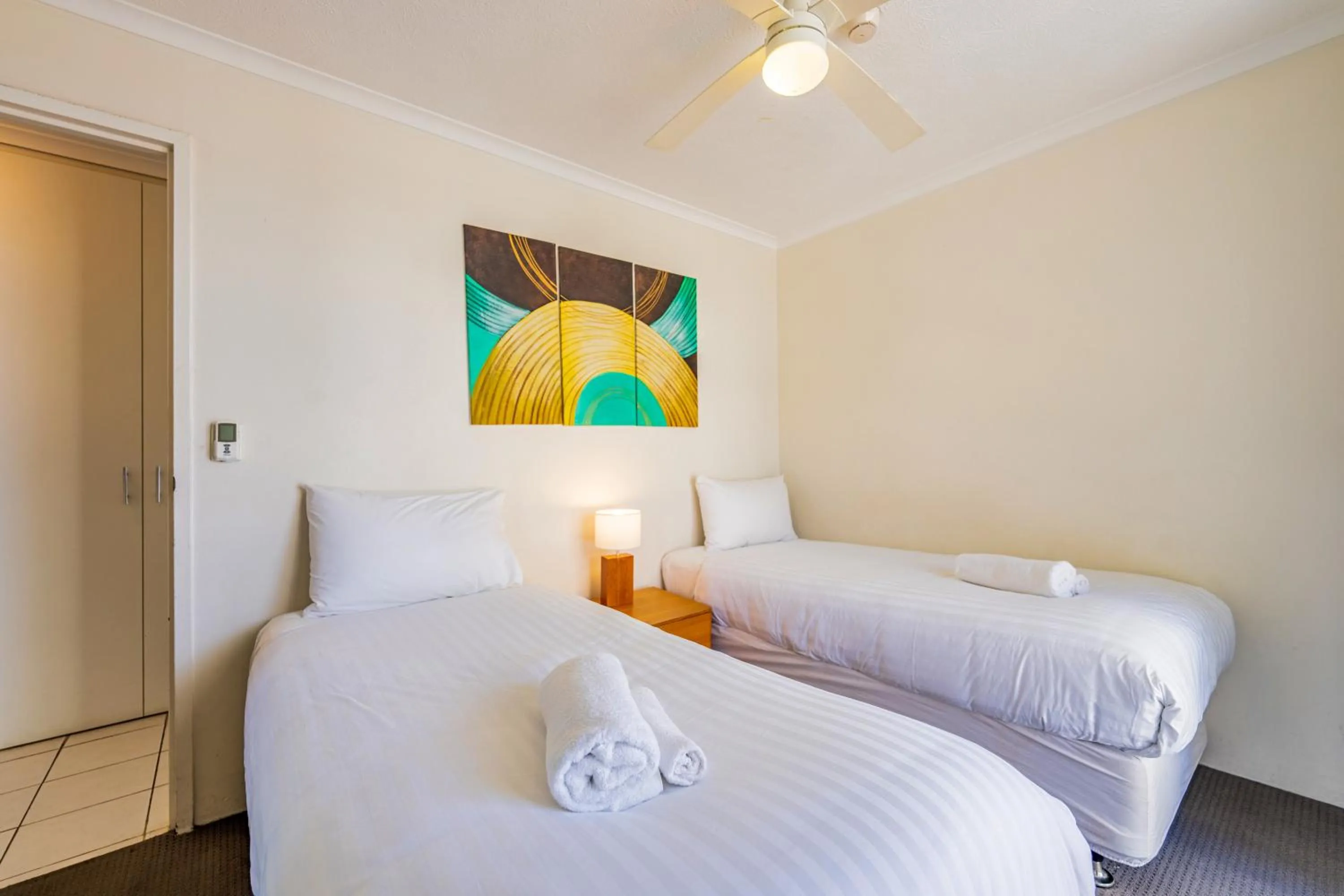 Bedroom, Bed in Olympus Beachfront Apartments